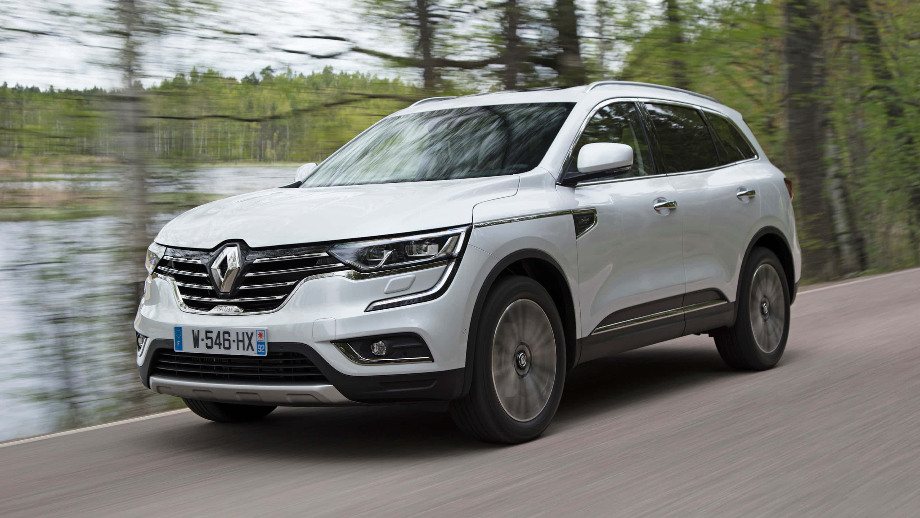 Renault Koleos, sleek white, forest-lined road, 2K Desktop Wallpaper