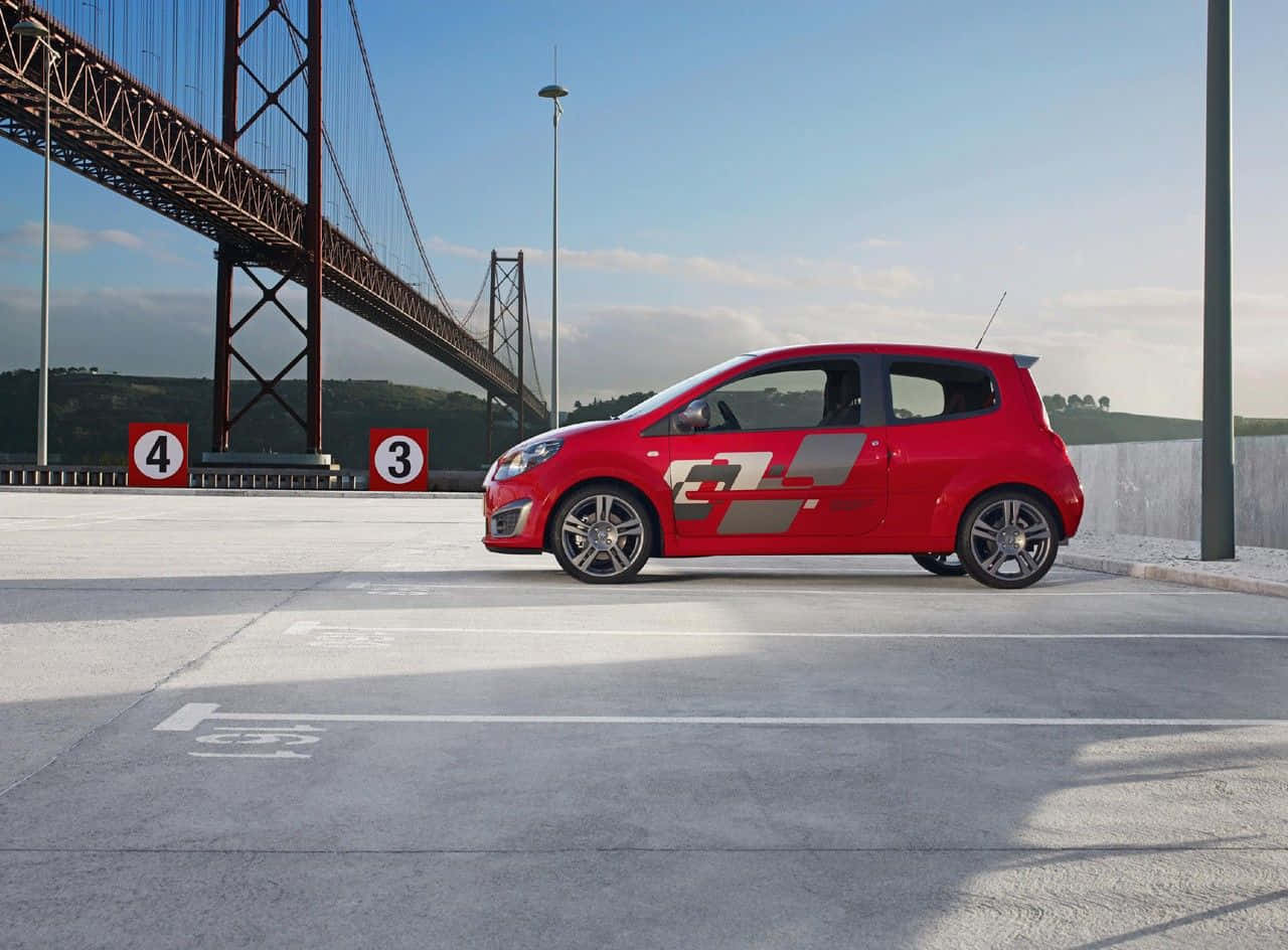 Red Renault Twingo, orange suspension bridge, concrete lot, HD Desktop Wallpaper