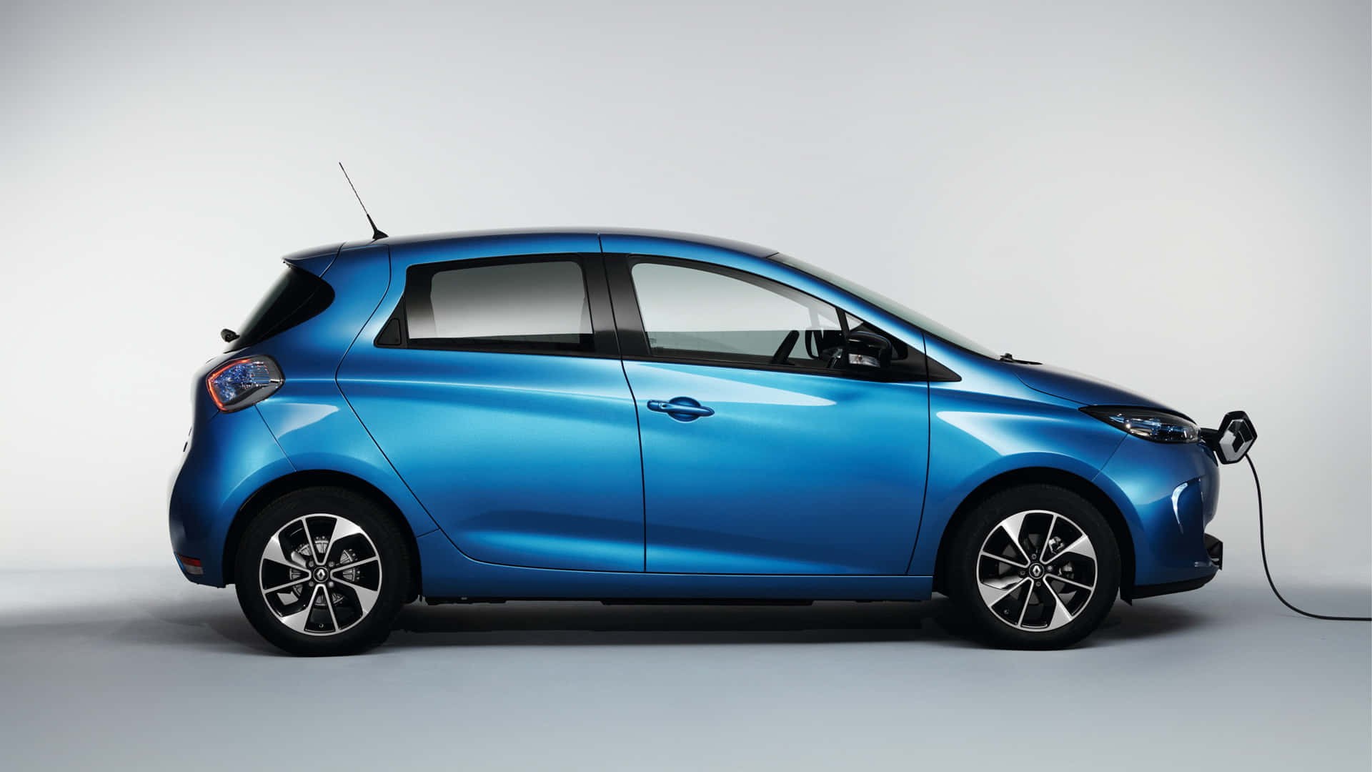 Renault Zoe, sleek blue electric car, plugged in, Full HD Desktop Wallpaper