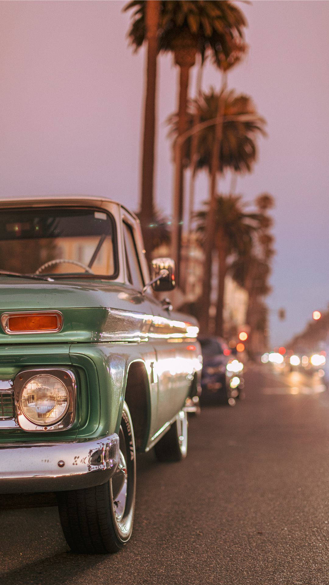 metallic green car, vintage green pickup truck, palm-lined street, Full HD Phone Wallpaper