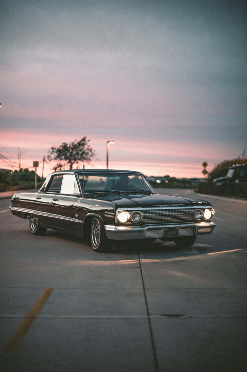 classic black sedan, chrome details, soft pink and purple sunset sky, HD Phone Wallpaper