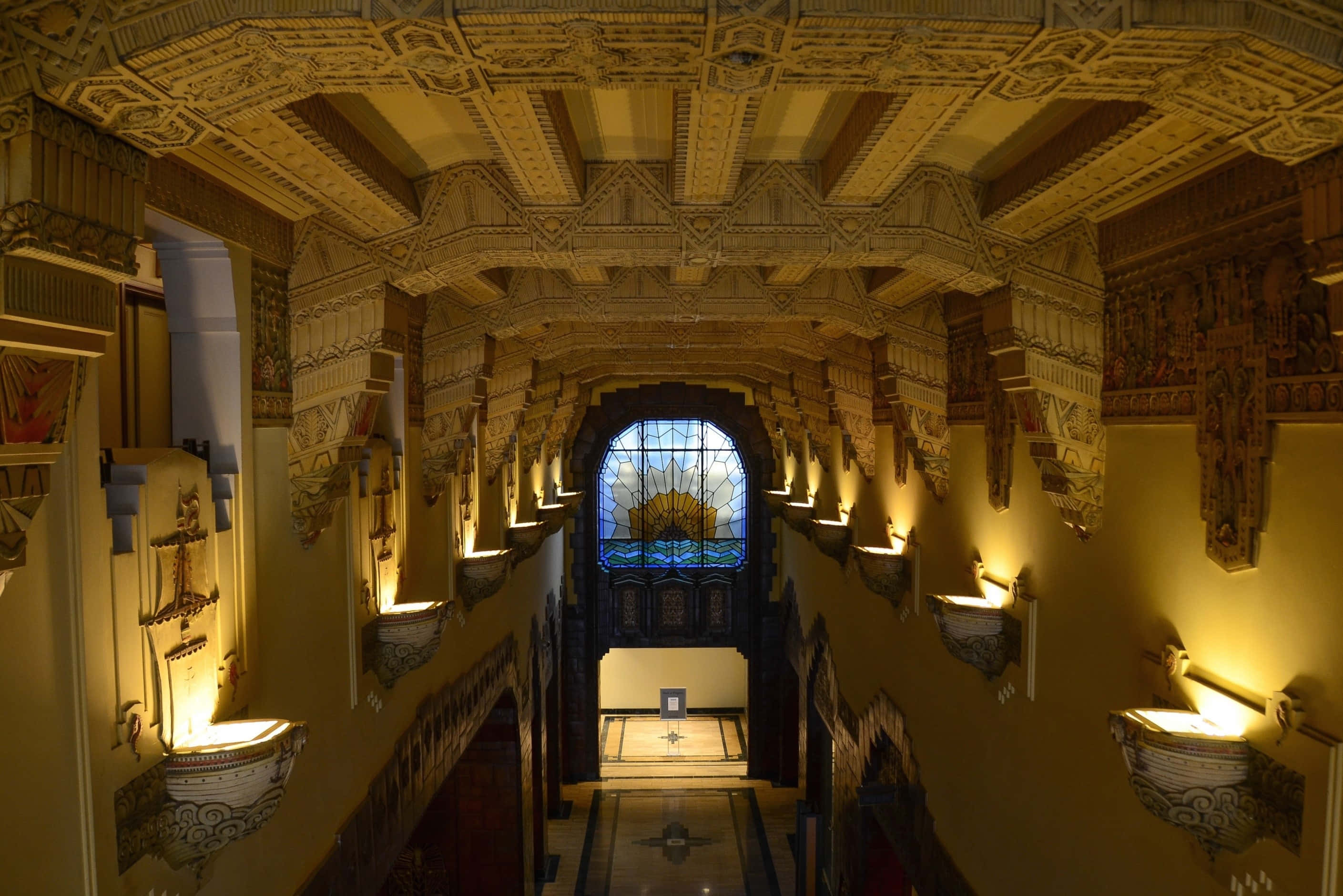 Art Deco computer, ornate hallway, intricate ceiling beams, 2K Desktop Wallpaper