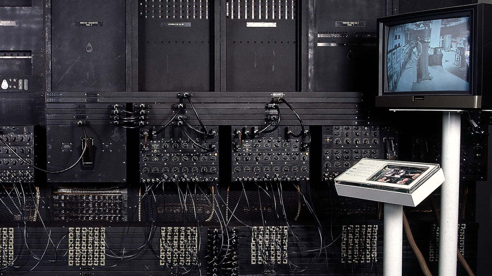 vintage computer room, black server racks, tangled wires, Full HD Desktop Wallpaper