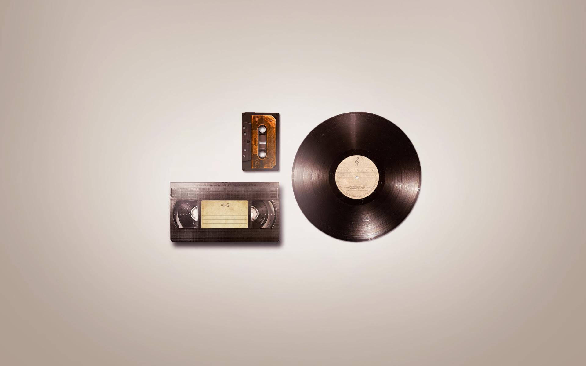 VHS tape cassette, vinyl record, neutral beige background, Full HD Desktop Wallpaper