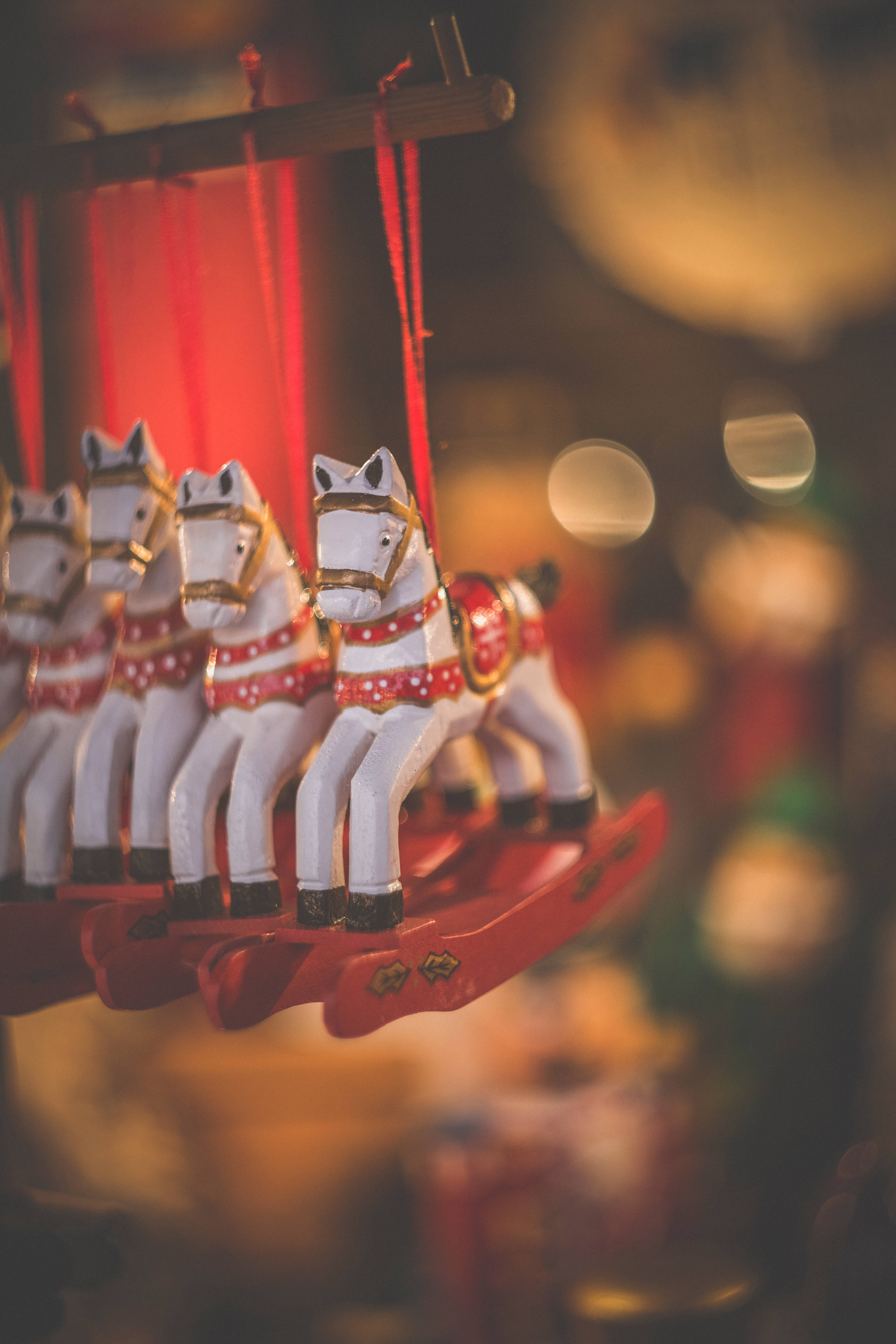 vintage halloween carousel, white wooden rocking horses, red harnesses, 5K Phone Wallpaper