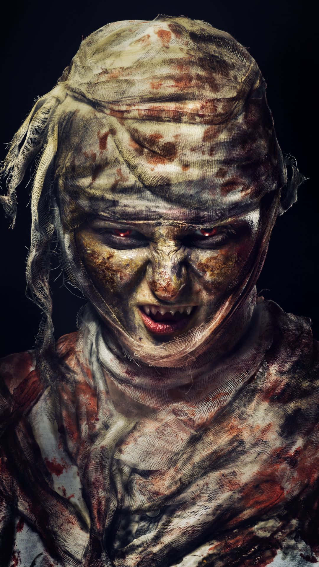 mummy costume, bloodstained wrappings, glowing red eyes, Full HD Phone Wallpaper