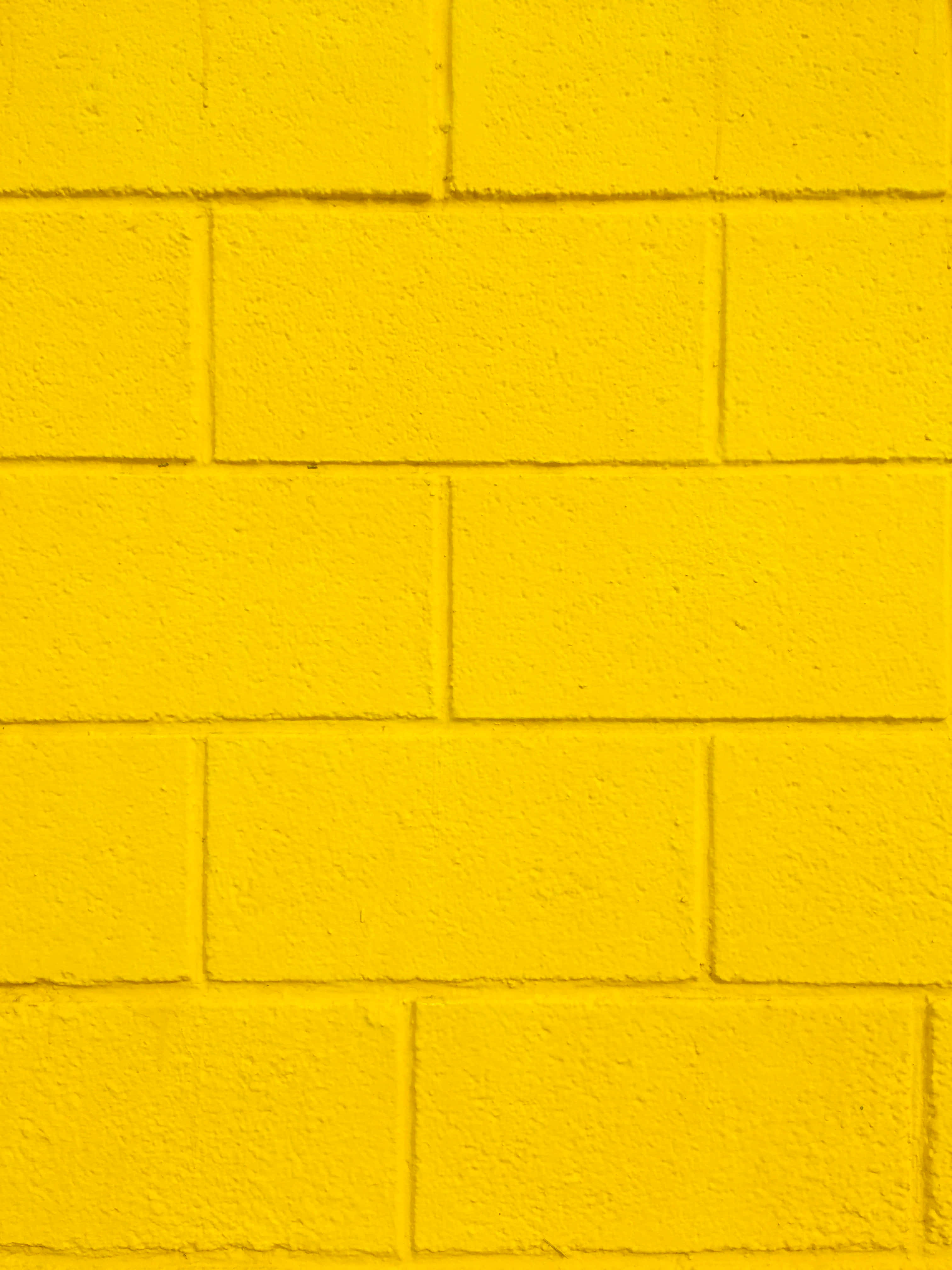 retro yellow, vibrant yellow, painted brick wall, 4K Phone Wallpaper
