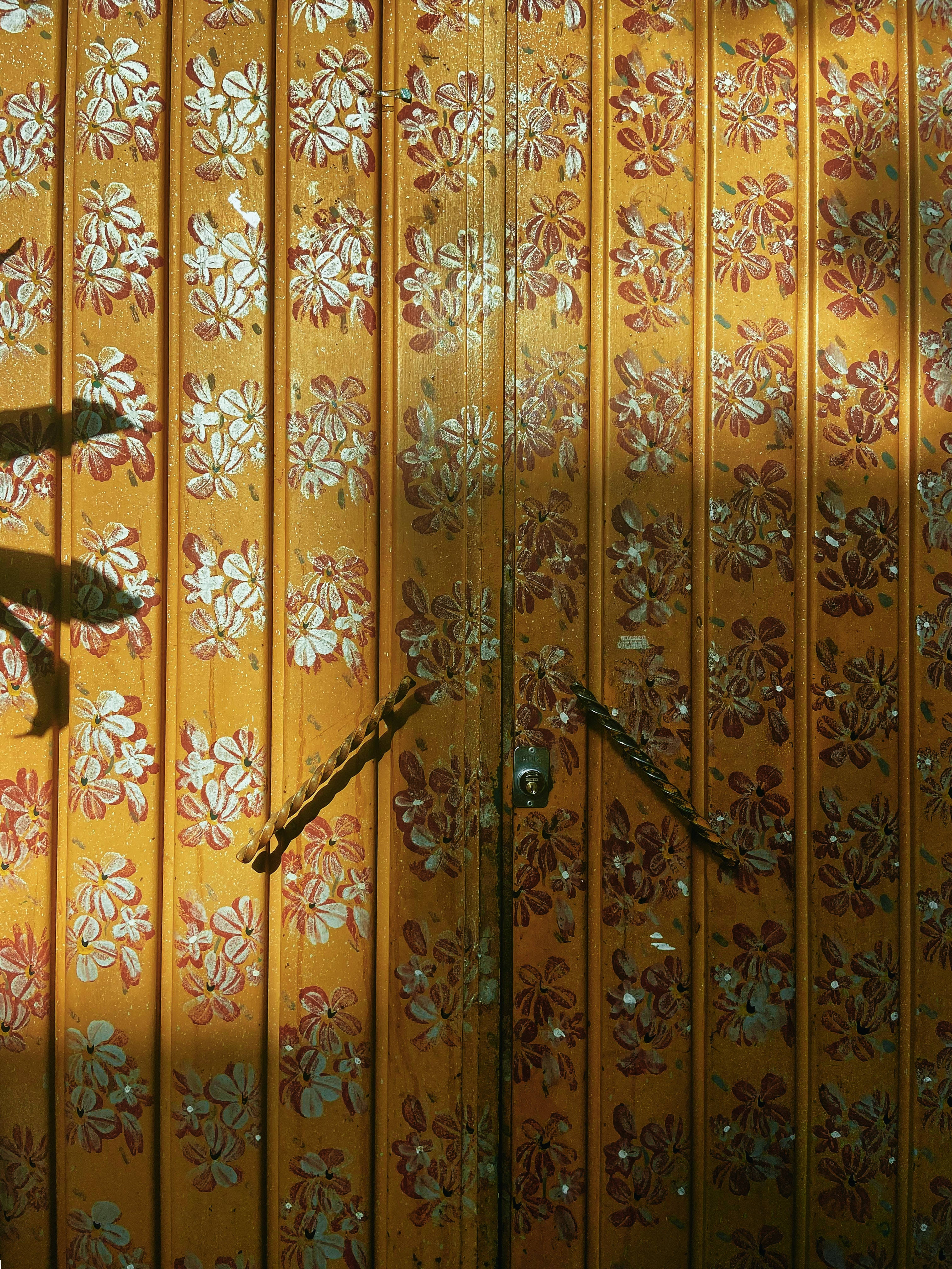 yellow vintage aesthetic, weathered wooden door, faded floral patterns, 4K Phone Wallpaper