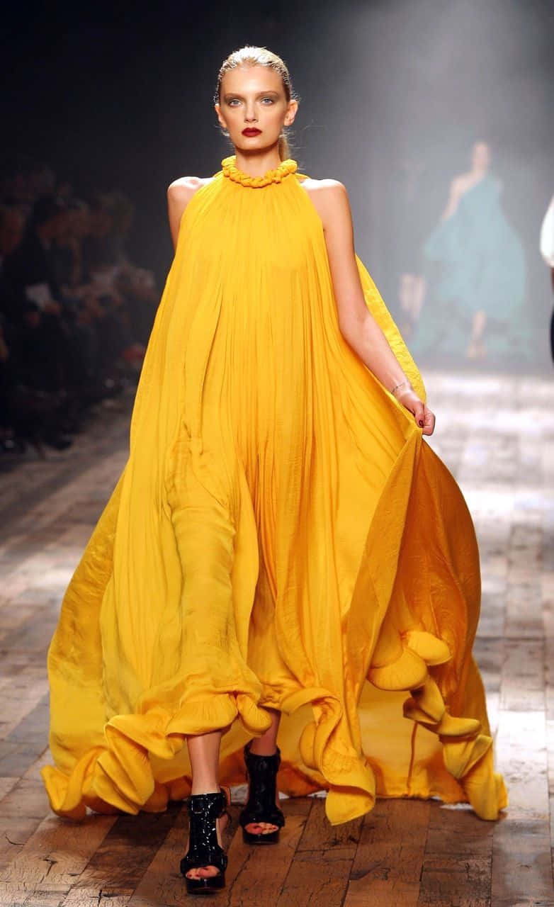 yellow gown, runway, dramatic stage lighting, HD Phone Wallpaper