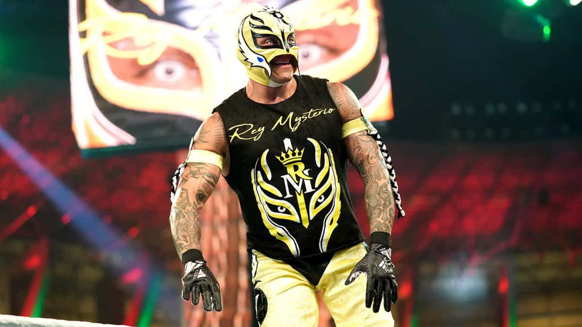 Rey Mysterio, yellow and black lucha libre gear, arena lights, SD Desktop Wallpaper
