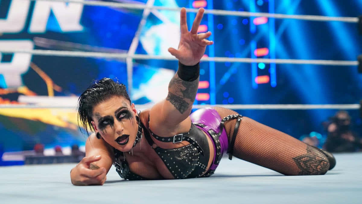 Rhea Ripley, wrestling match, victory gesture, SD Desktop Wallpaper