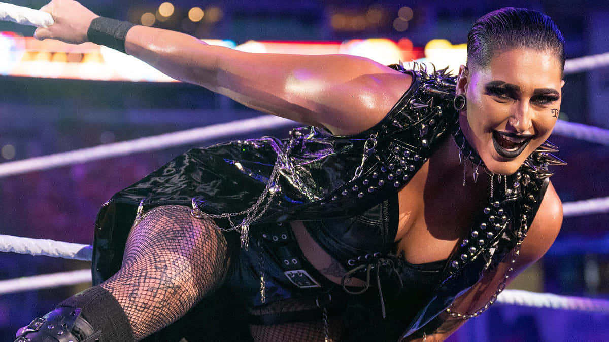 Rhea Ripley, black studded outfit, wrestling ring, SD Desktop Wallpaper