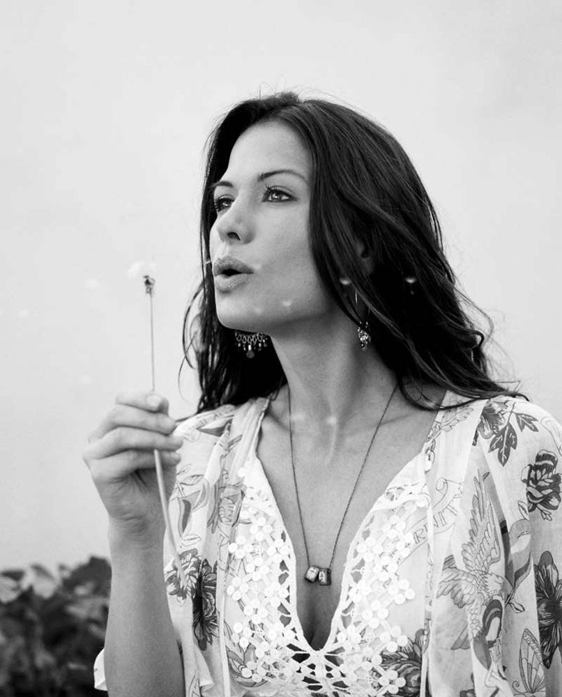 Rhona Mitra, floral dress, dandelion seeds, SD Phone Wallpaper