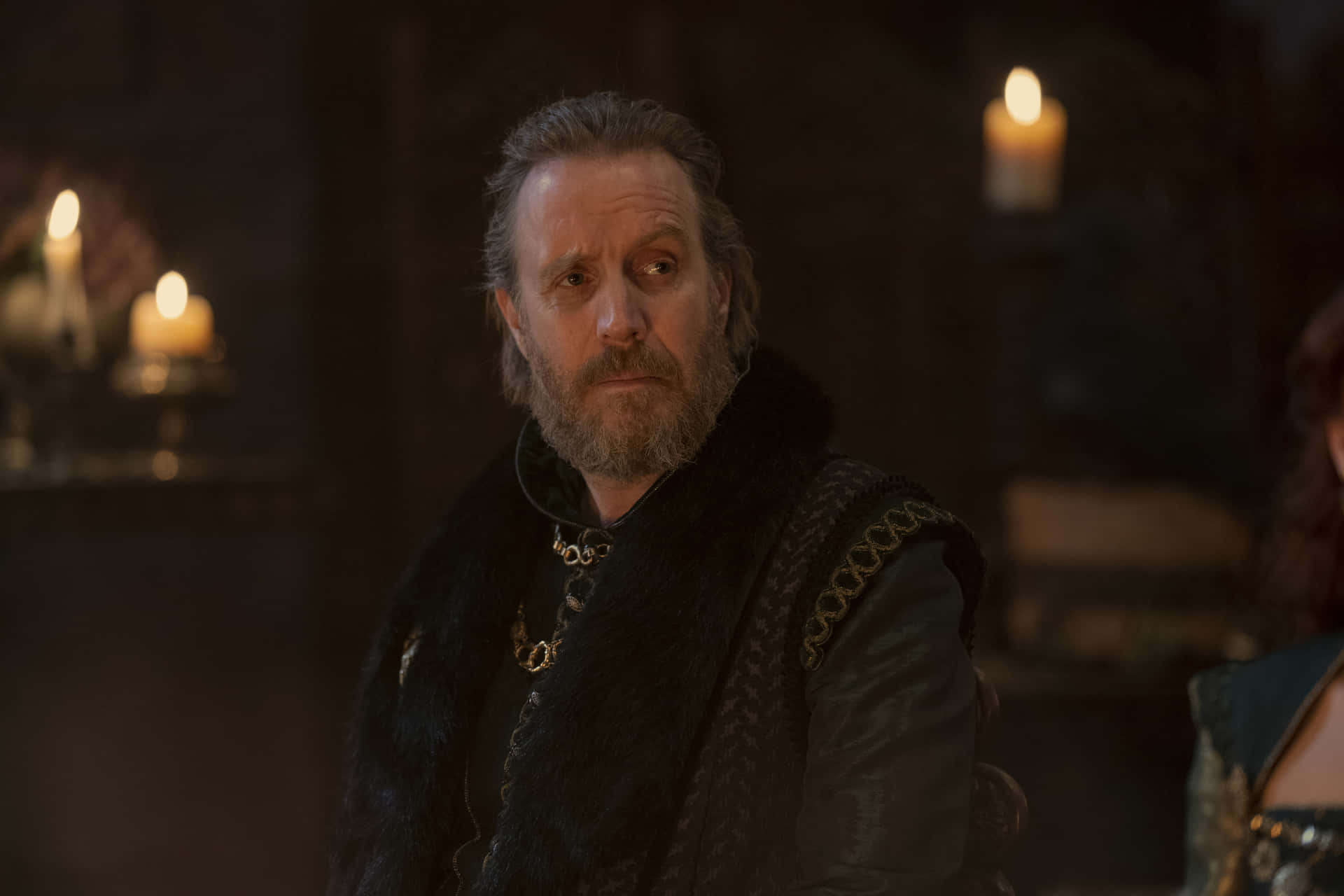 Rhys Ifans, dark medieval attire, candlelit dim room, Full HD Desktop Wallpaper