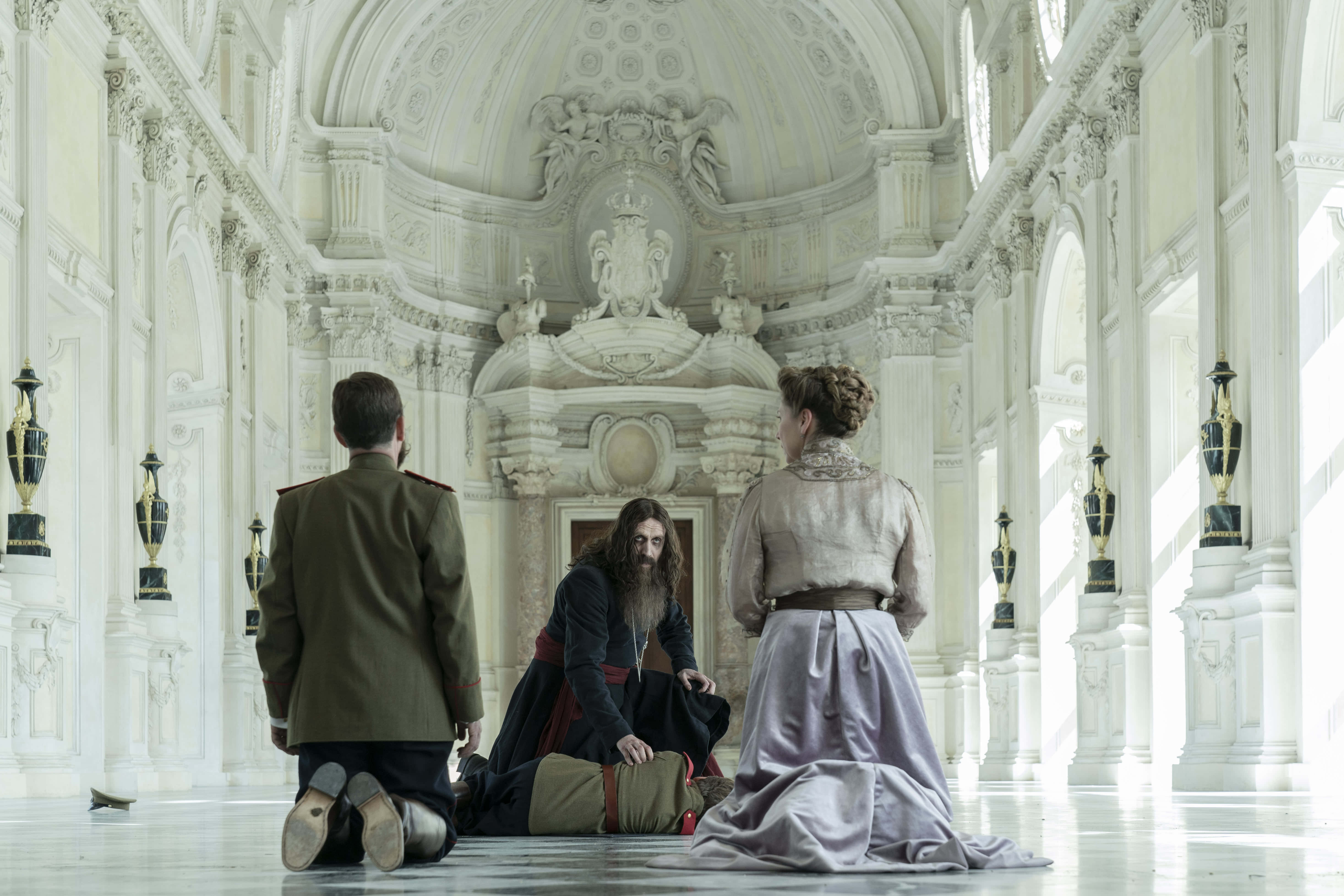 Rhys Ifans, white baroque hall, ornate ceilings, 5K Desktop Wallpaper