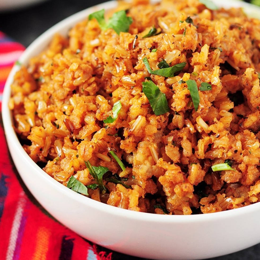 white bowl, golden-brown spiced rice, fresh green cilantro, SD Phone Wallpaper