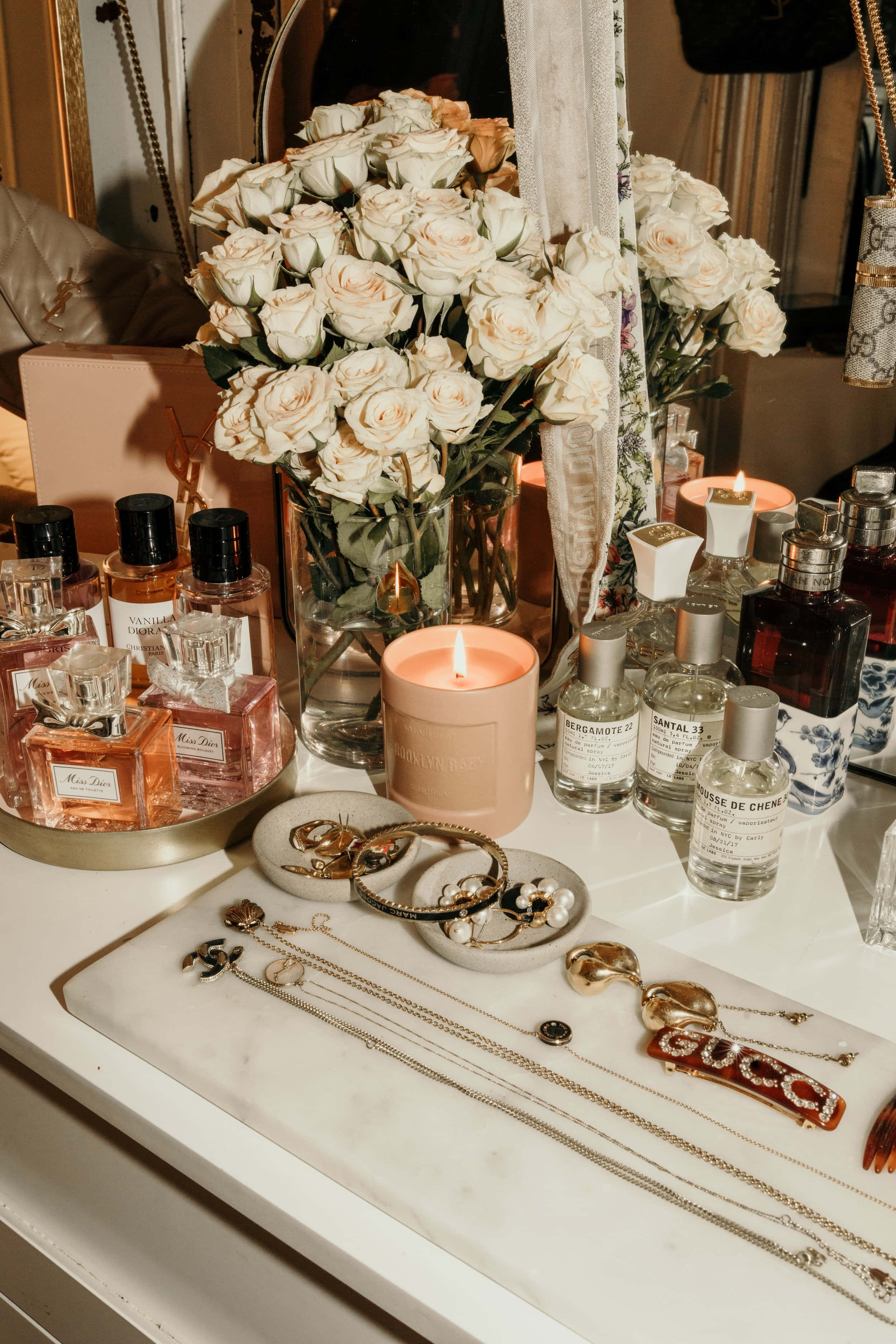luxurious vanity table, white roses, lit candle, 2K Phone Wallpaper