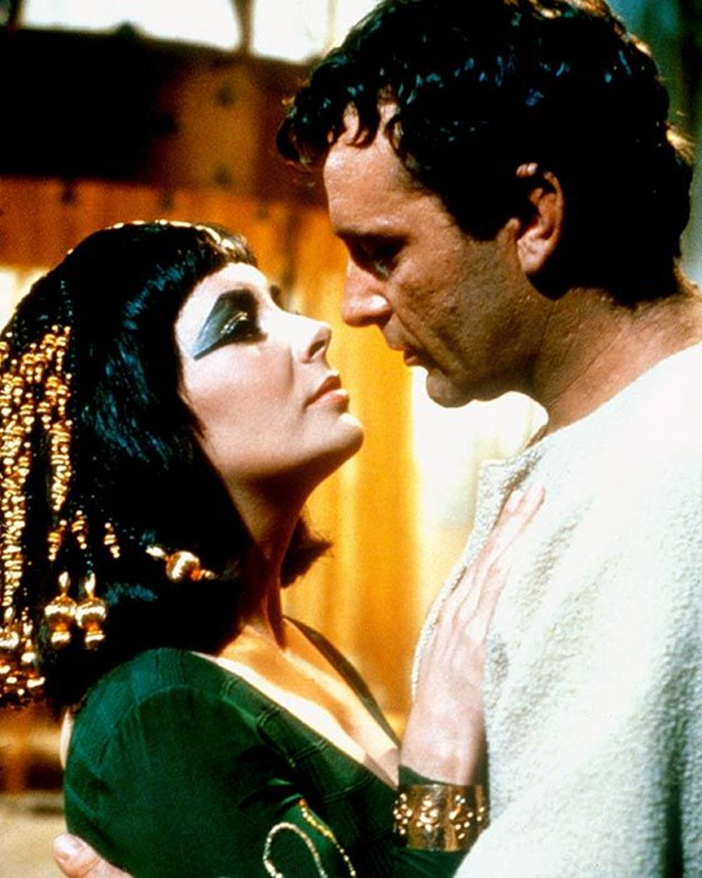 Richard Burton, ancient Egyptian attire, warmly lit indoor scene, SD Phone Wallpaper
