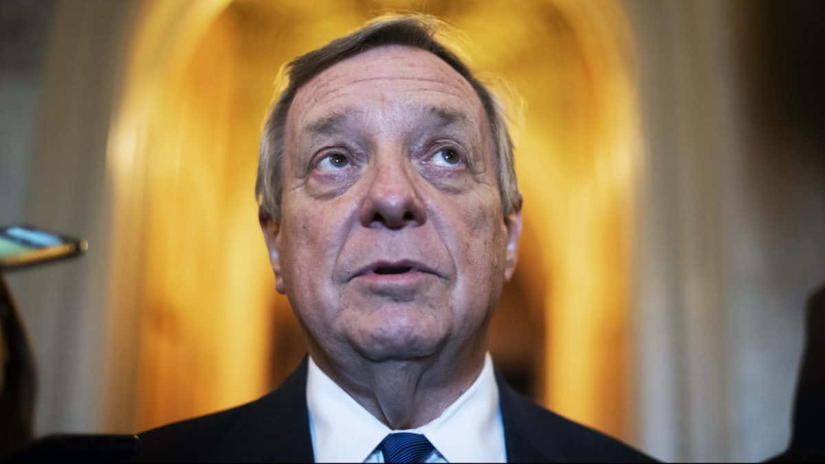 Richard Durbin, suit, golden background, SD Desktop Wallpaper