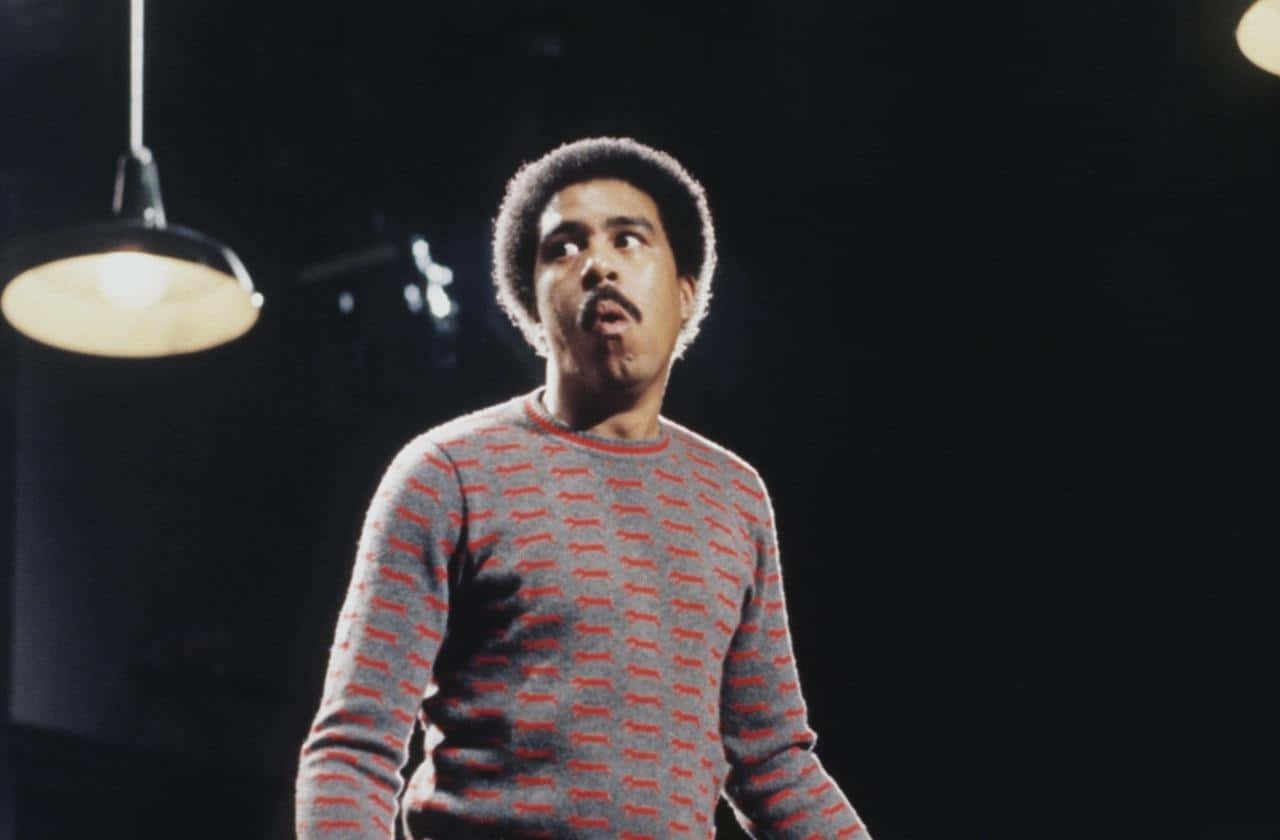 Richard Pryor, red and gray patterned sweater, studio light, HD Desktop Wallpaper