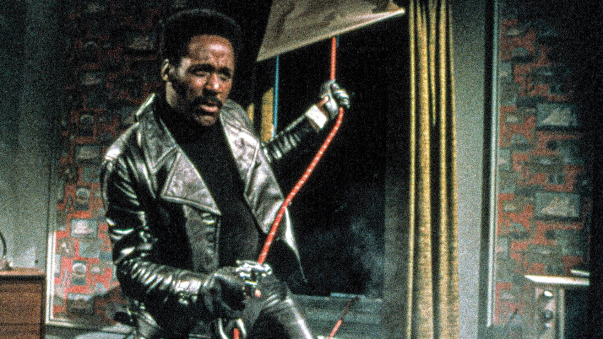 Richard Roundtree, shiny black leather jacket, red corded device, Full HD Desktop Wallpaper