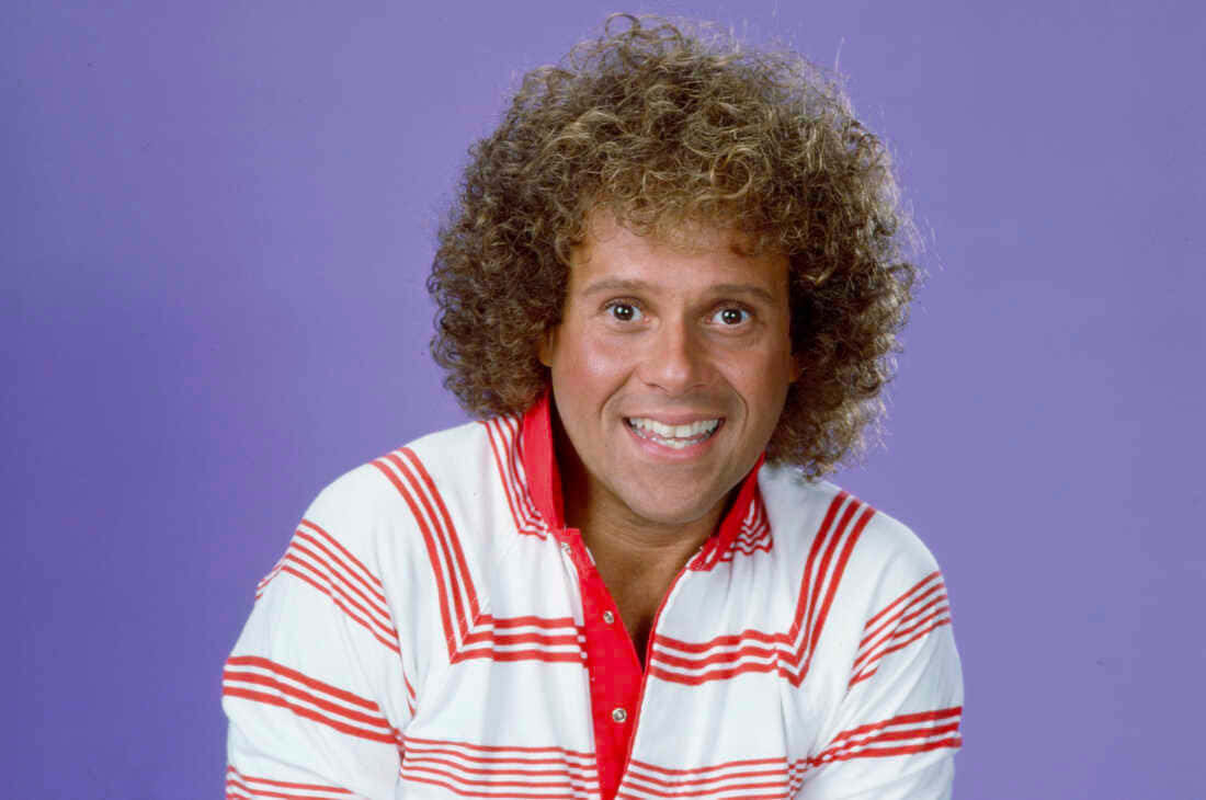 Richard Simmons, red and white striped polo shirt, solid purple background, SD Desktop Wallpaper