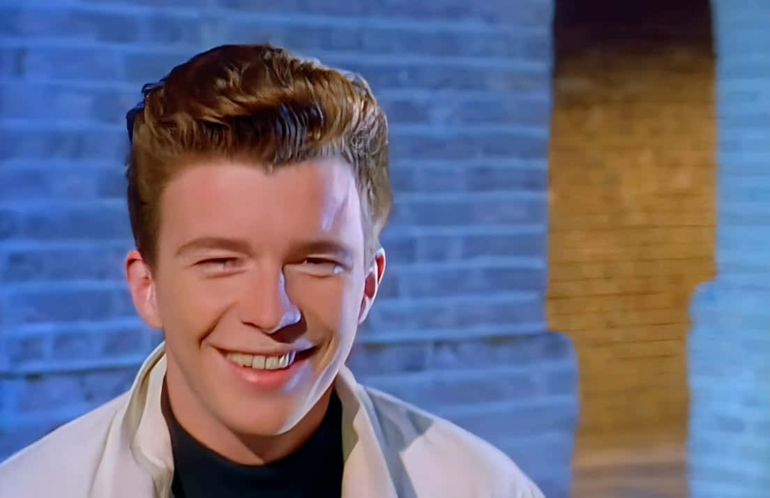 Rick Astley, concert, blue brick wall, SD Desktop Wallpaper