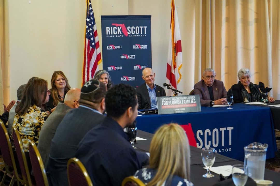 Rick Scott, roundtable meeting, blue table, SD Desktop Wallpaper