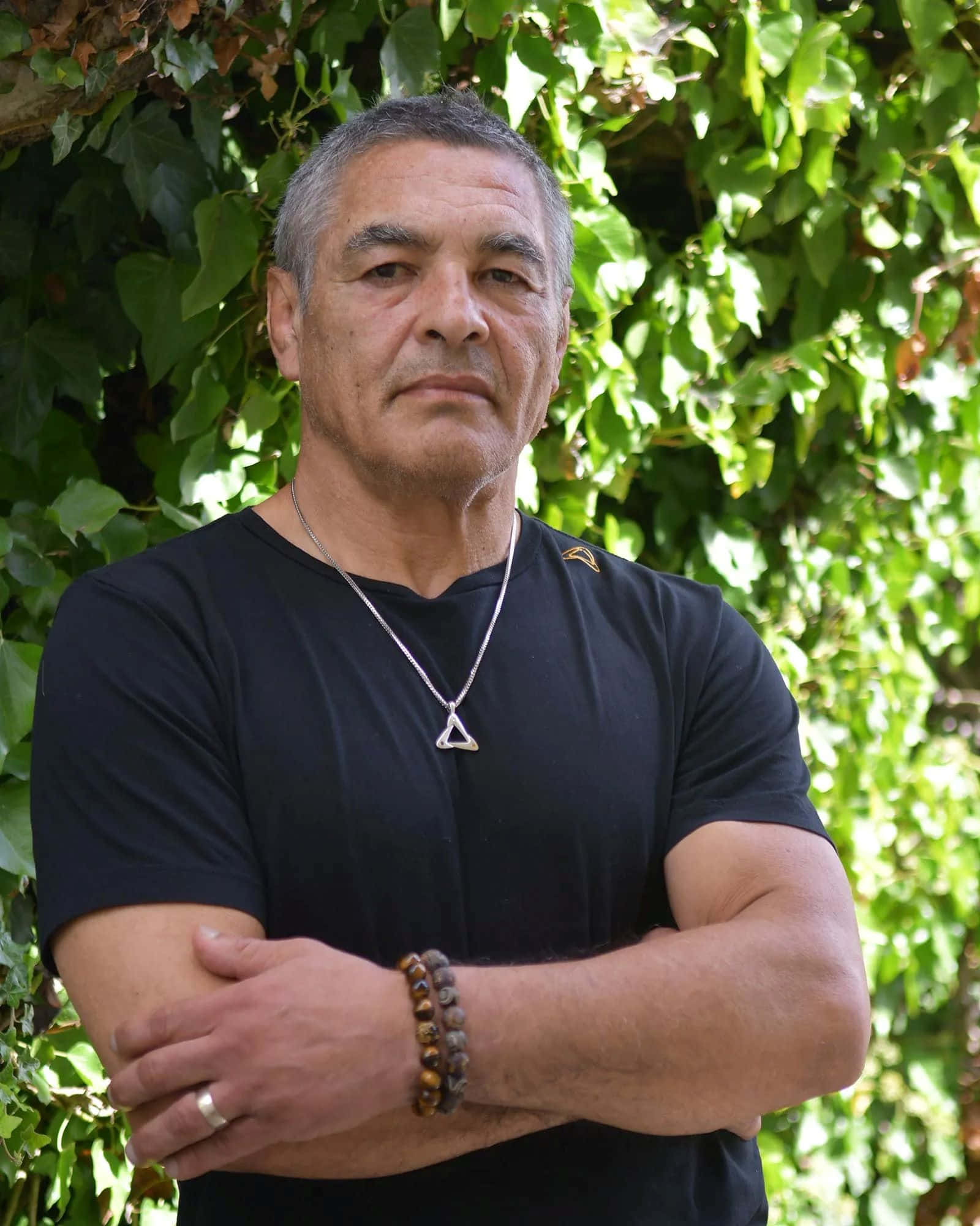 Rickson Gracie, black tshirt, silver triangle pendant, Full HD Phone Wallpaper