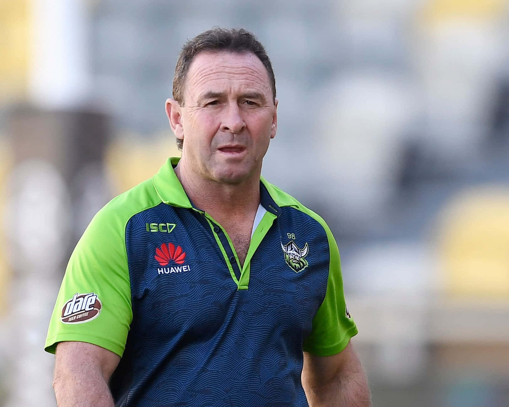 Ricky Stuart, green and blue sports polo shirt, blurred stadium field, HD Desktop Wallpaper