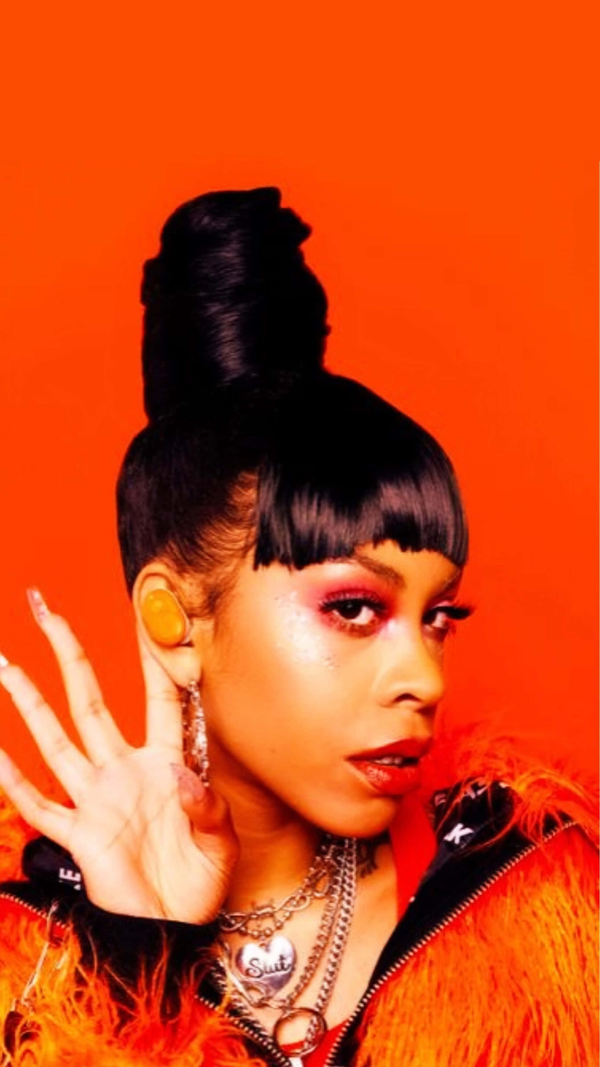 Rico Nasty, feathered jacket, vivid orange background, 2K Phone Wallpaper