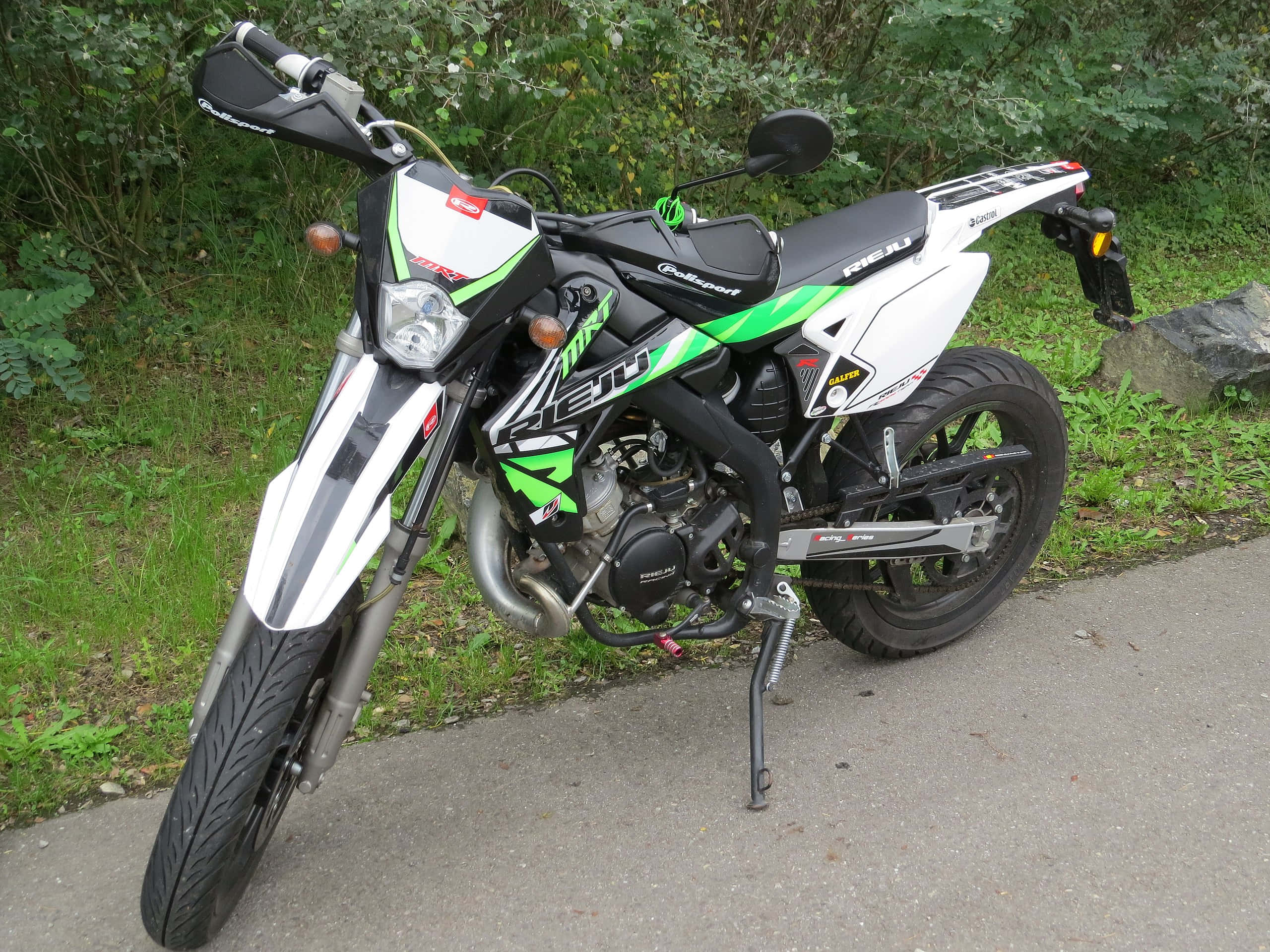 Rieju, white and green dirt bike, black accents, 2K Desktop Wallpaper