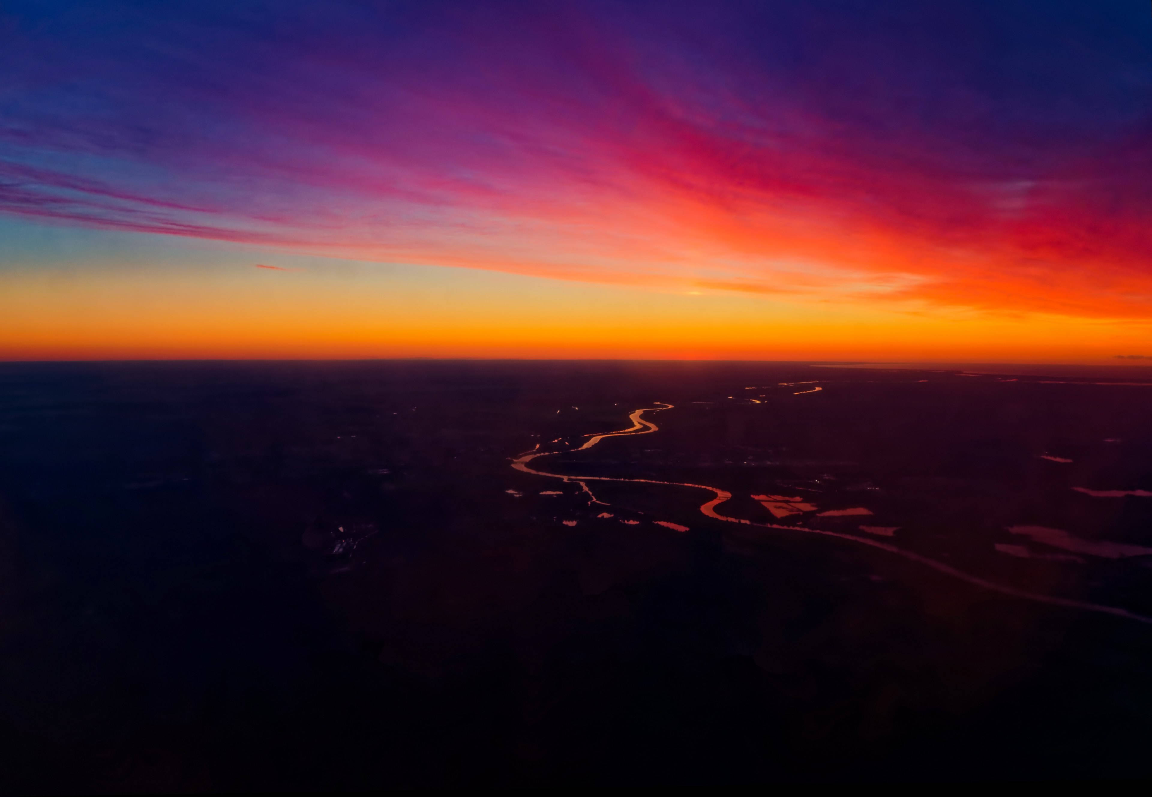 Riga, sunset sky, winding river, 4K Desktop Wallpaper