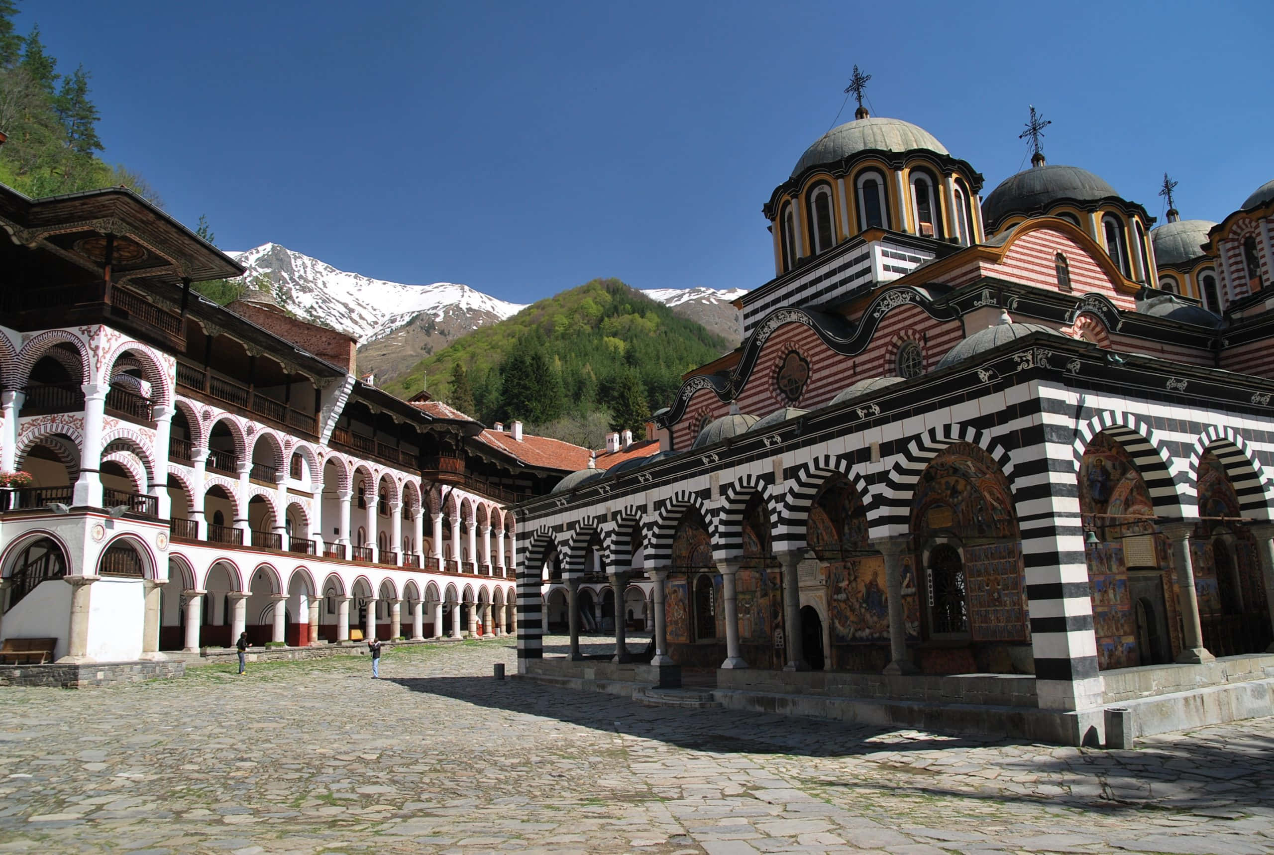 Rila Monastery, courtyard, striped arches, 2K Desktop Wallpaper