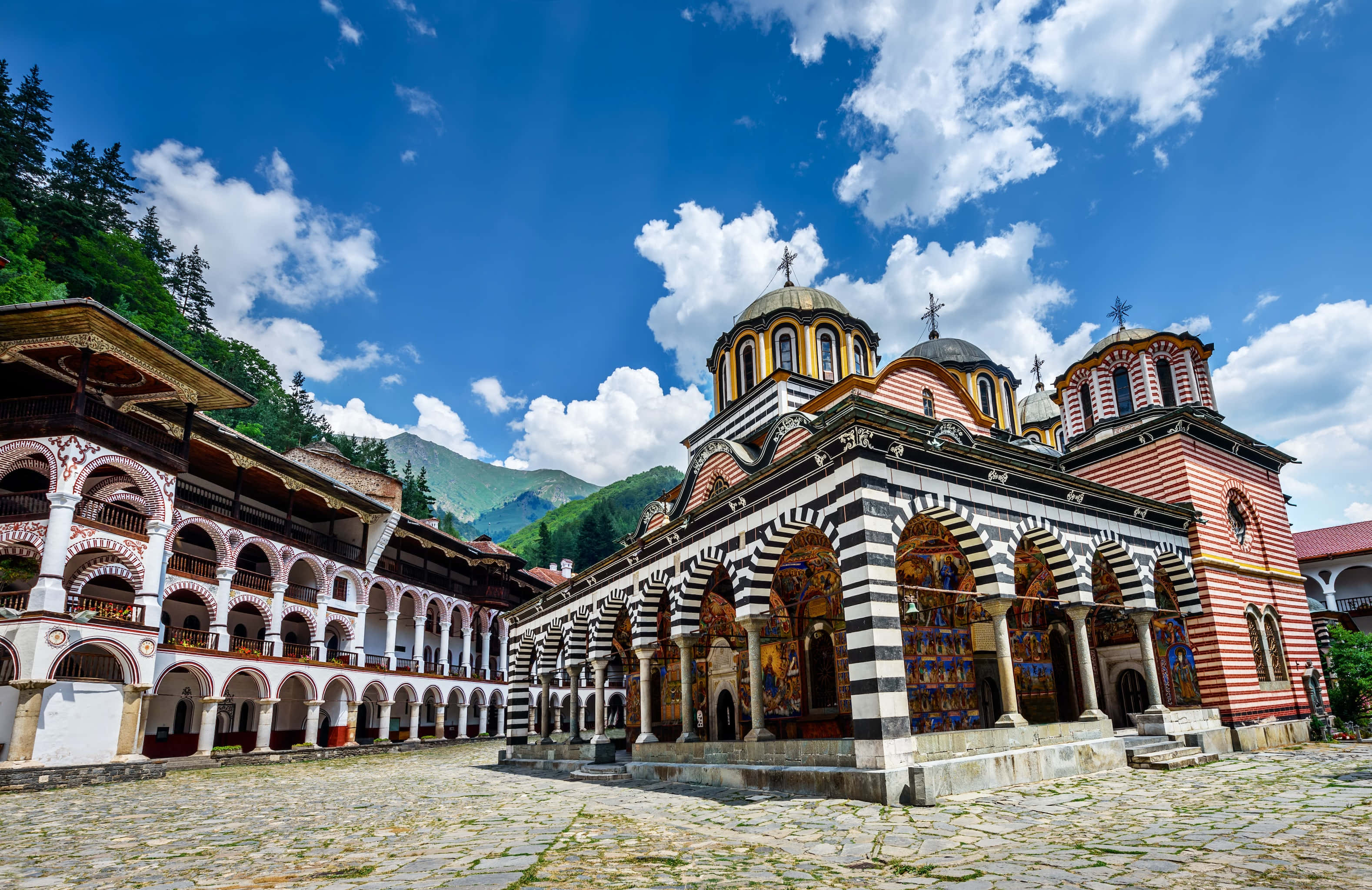 Rila Monastery, striped arches, domes, 2K Desktop Wallpaper