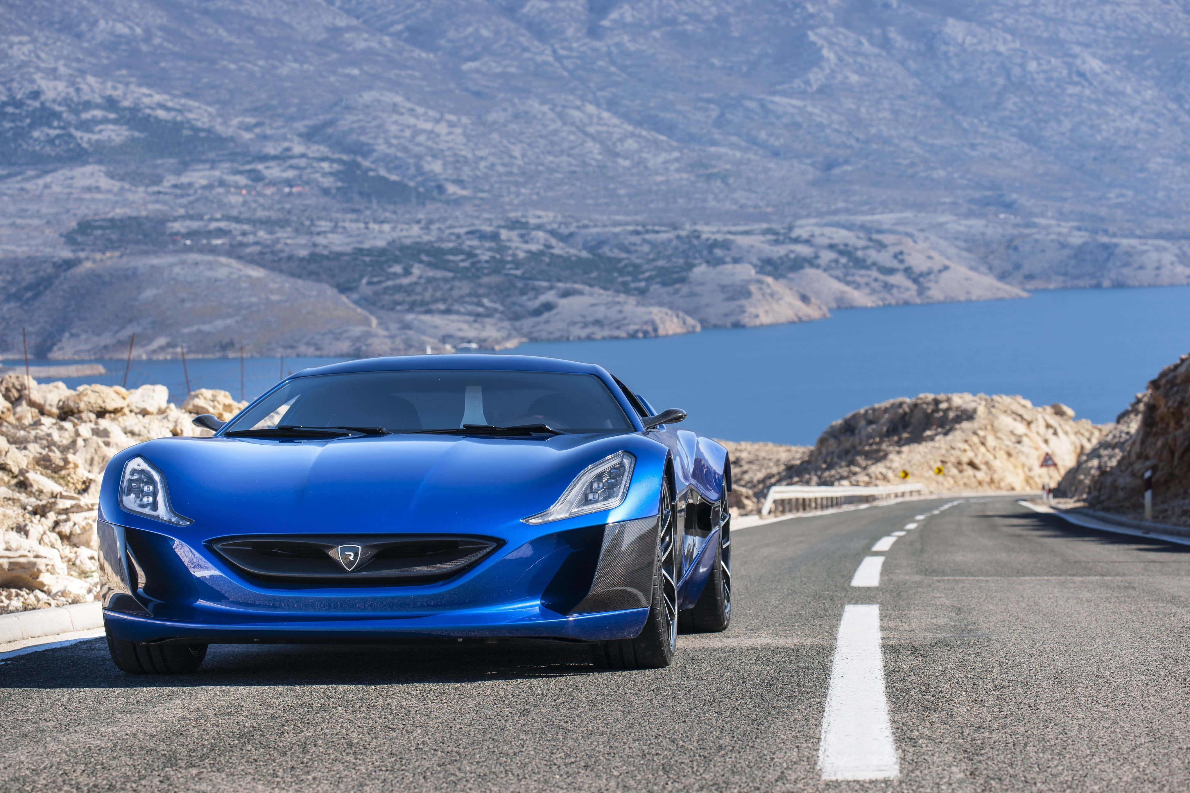 Rimac Concept One, vibrant blue, coastal road, 4K Desktop Wallpaper