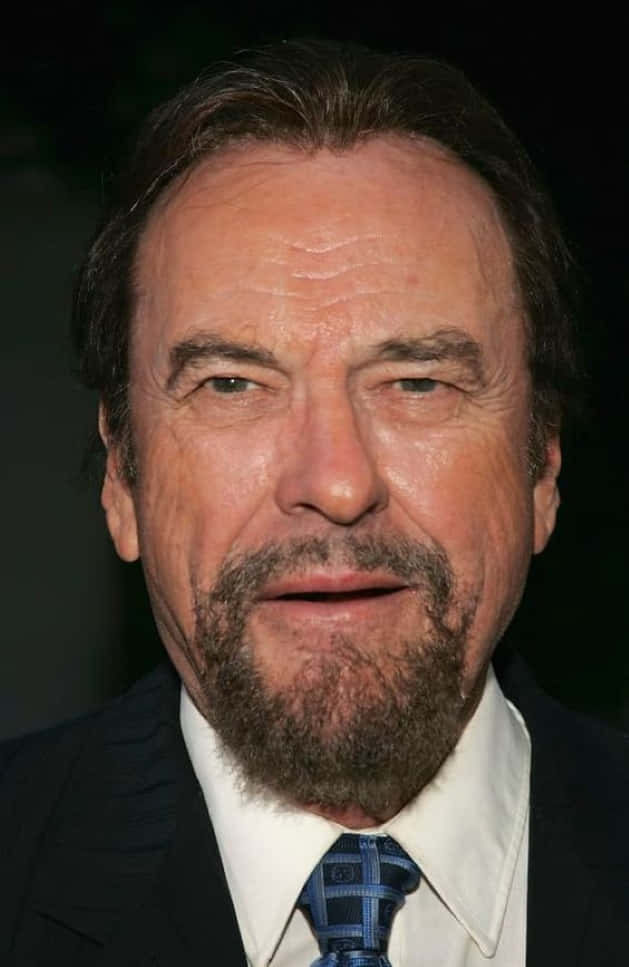 Rip Torn, dark suit, patterned tie, SD Phone Wallpaper