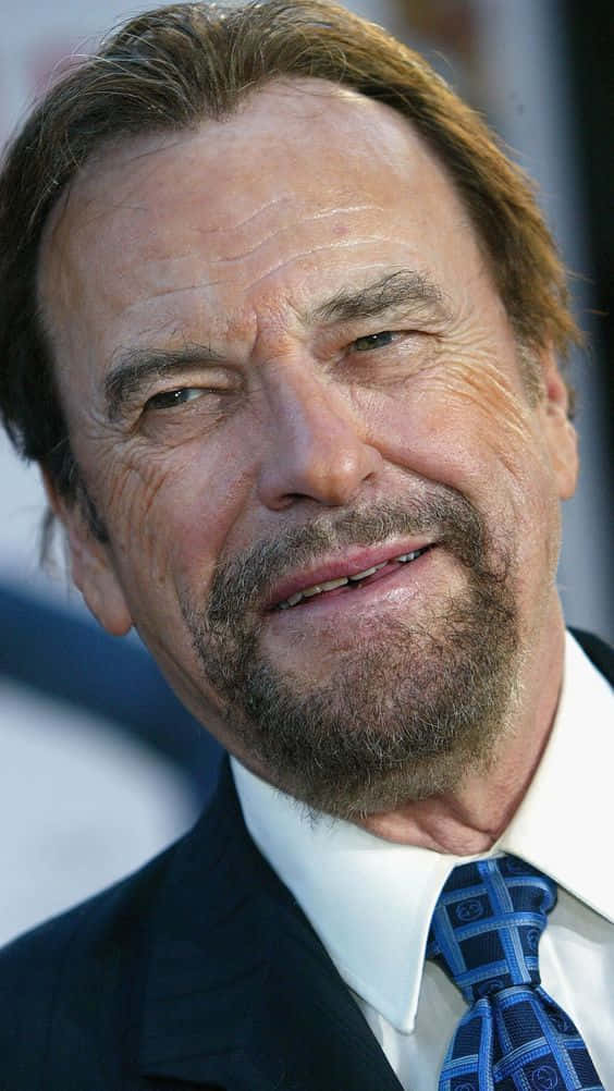 Rip Torn, dark suit, blue patterned tie, SD Phone Wallpaper