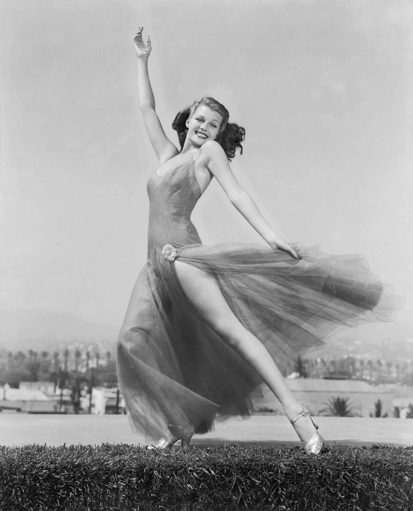 Rita Hayworth, flowing gown, grassy hill, Full HD Phone Wallpaper