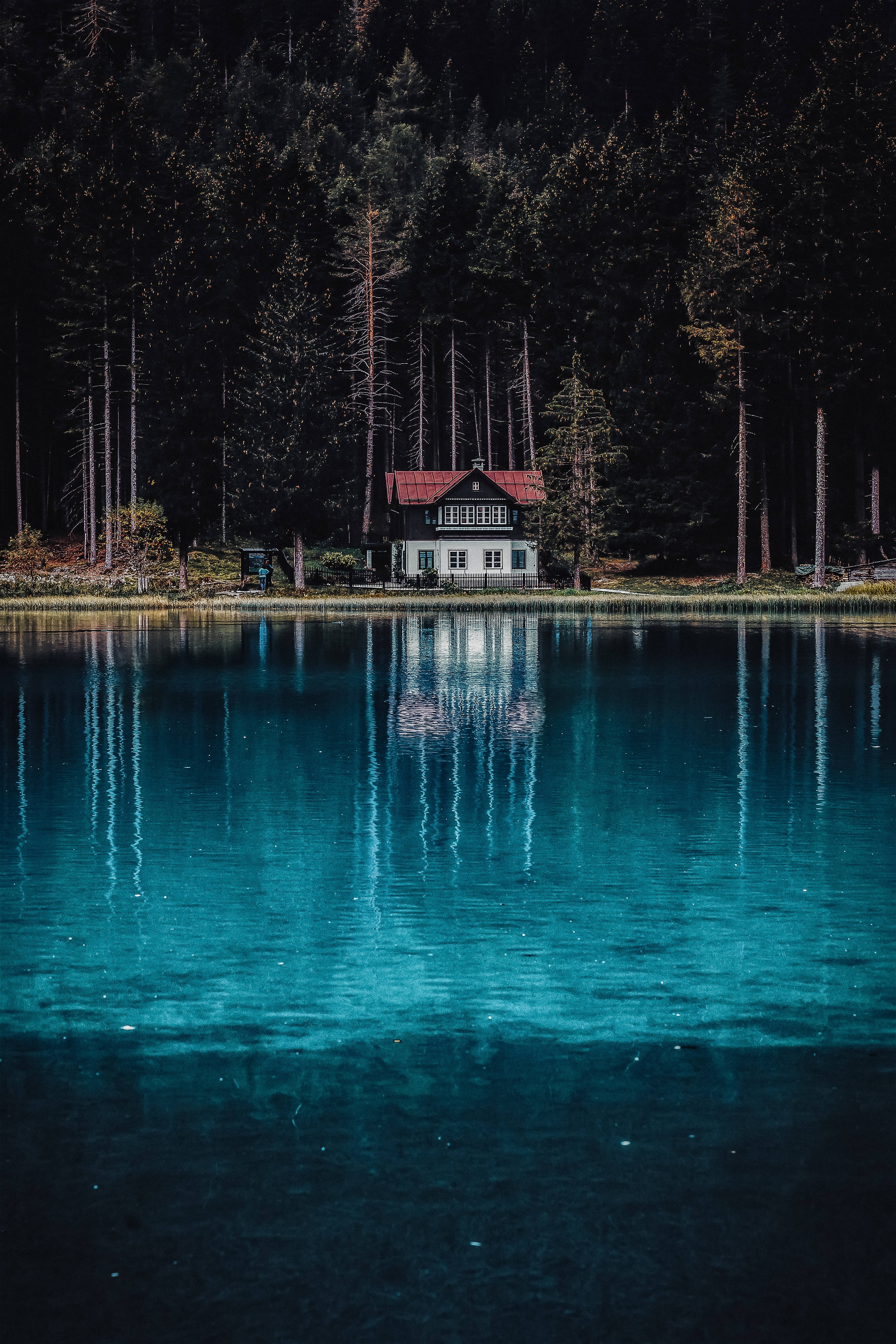 dark blue river view, white cabin, red roof, 5K Phone Wallpaper