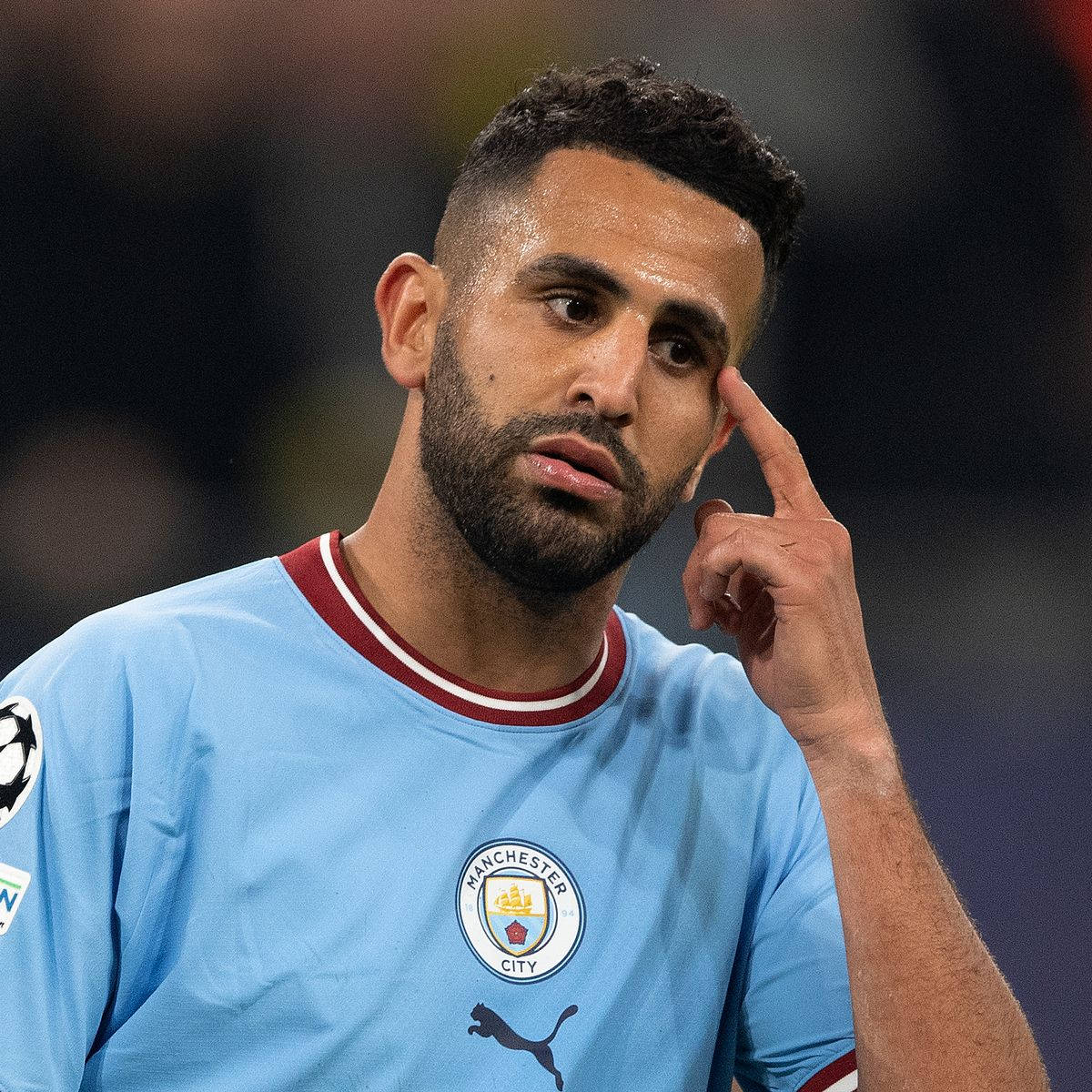 Riyad Mahrez, light blue Manchester City jersey, touching his temple, SD Desktop Wallpaper