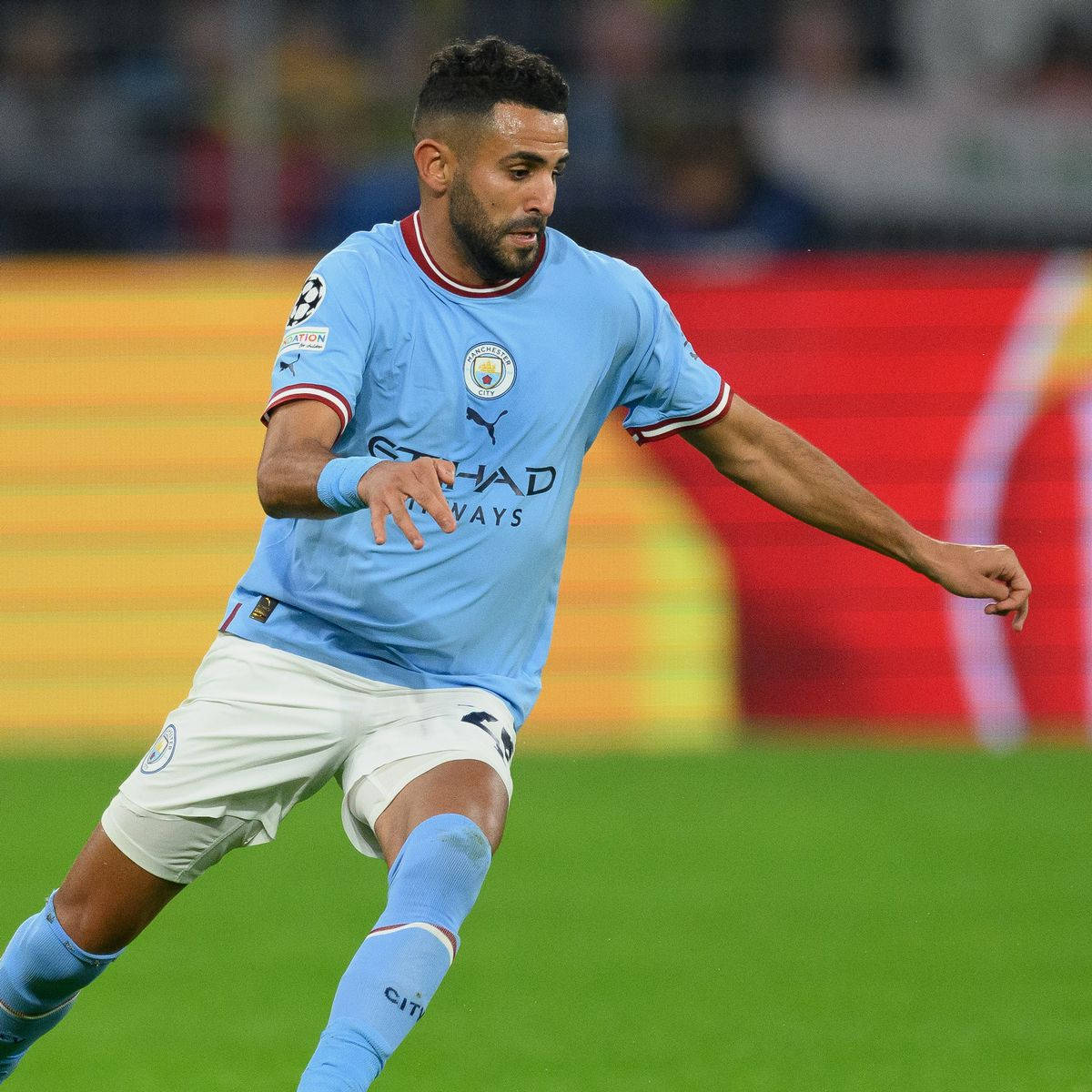 Riyad Mahrez, light blue Manchester City jersey, vibrant green pitch, SD Desktop Wallpaper