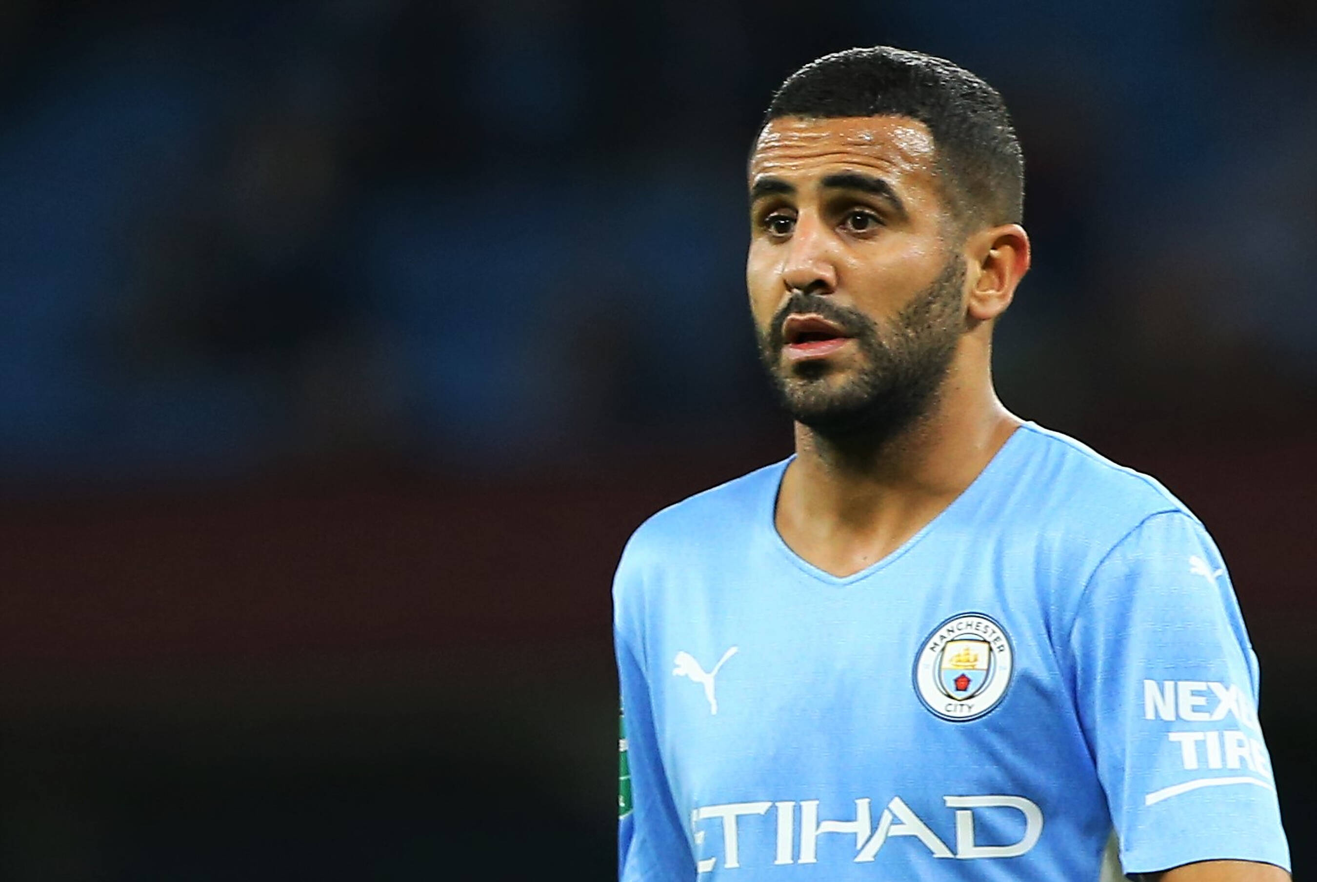 Riyad Mahrez, light blue Manchester City jersey, stadium field, 2K Desktop Wallpaper