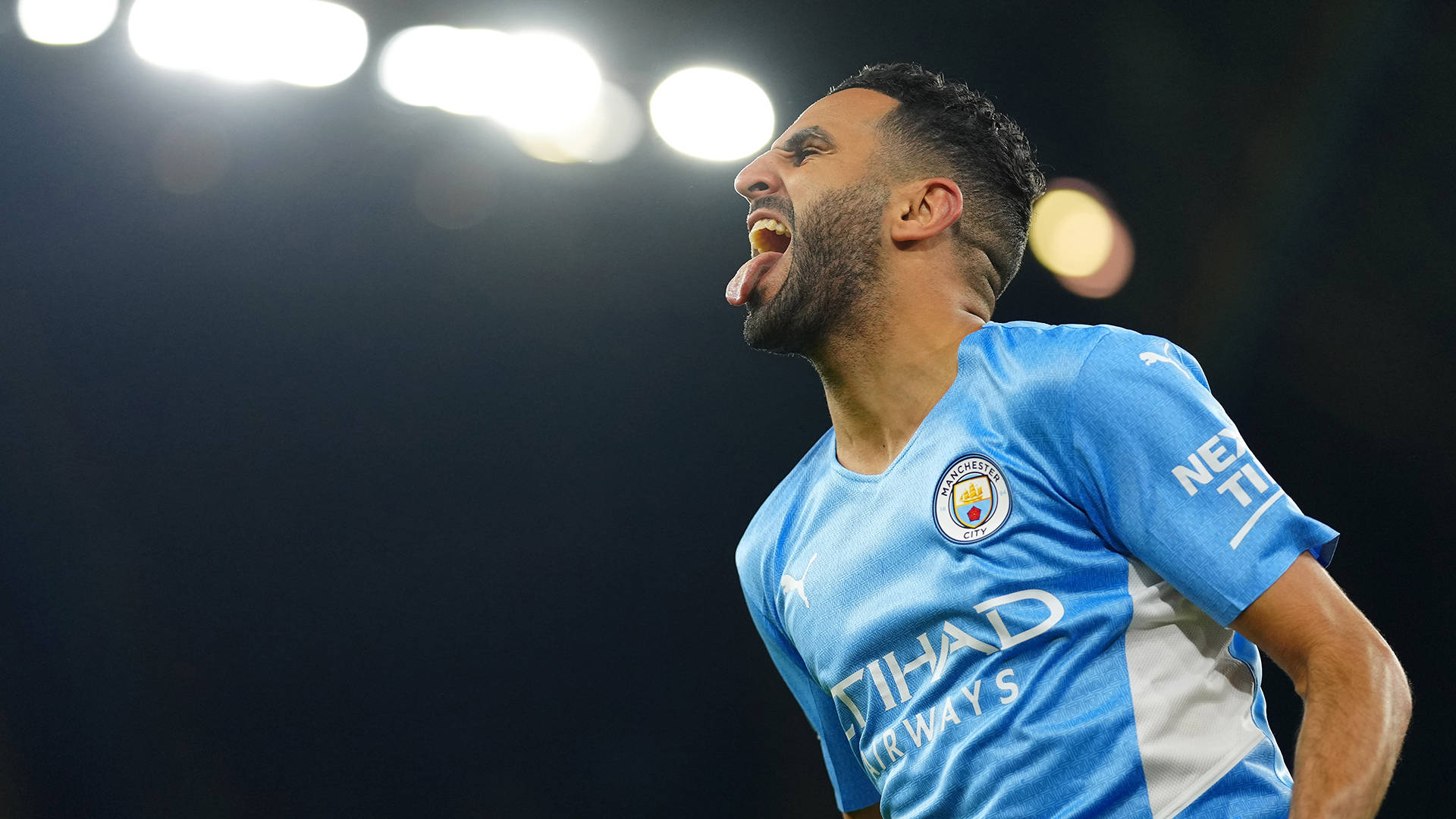 Riyad Mahrez, blue Manchester City jersey, stadium lights, Full HD Desktop Wallpaper