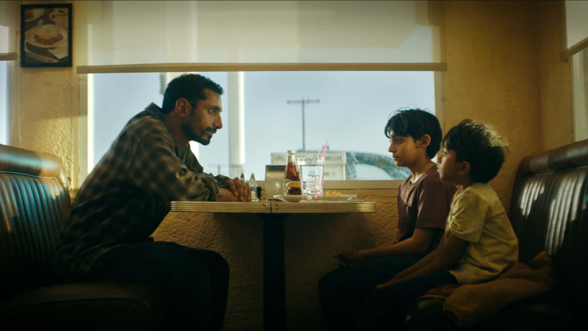 Riz Ahmed, diner scene, plaid shirt, Full HD Desktop Wallpaper