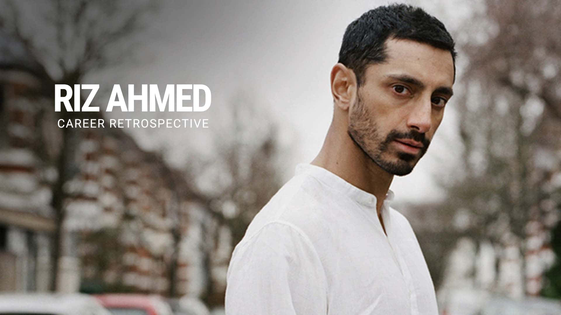 Riz Ahmed, white shirt, blurred urban street, Full HD Desktop Wallpaper