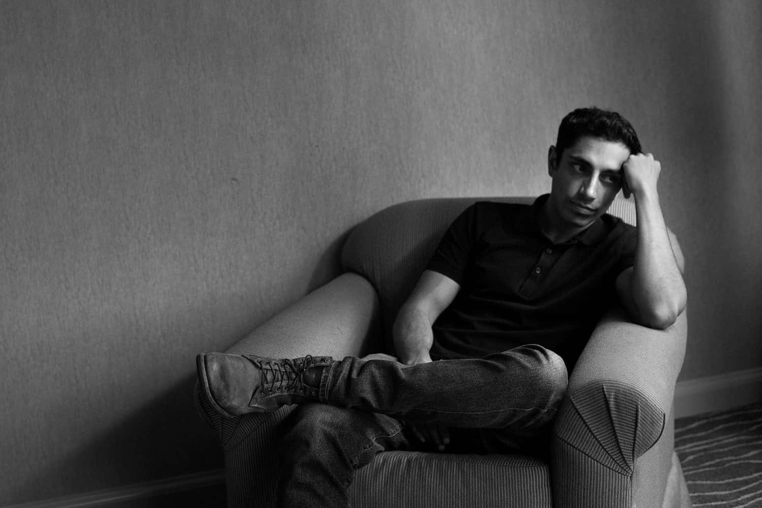 Riz Ahmed, black polo, jeans, HD Desktop Wallpaper