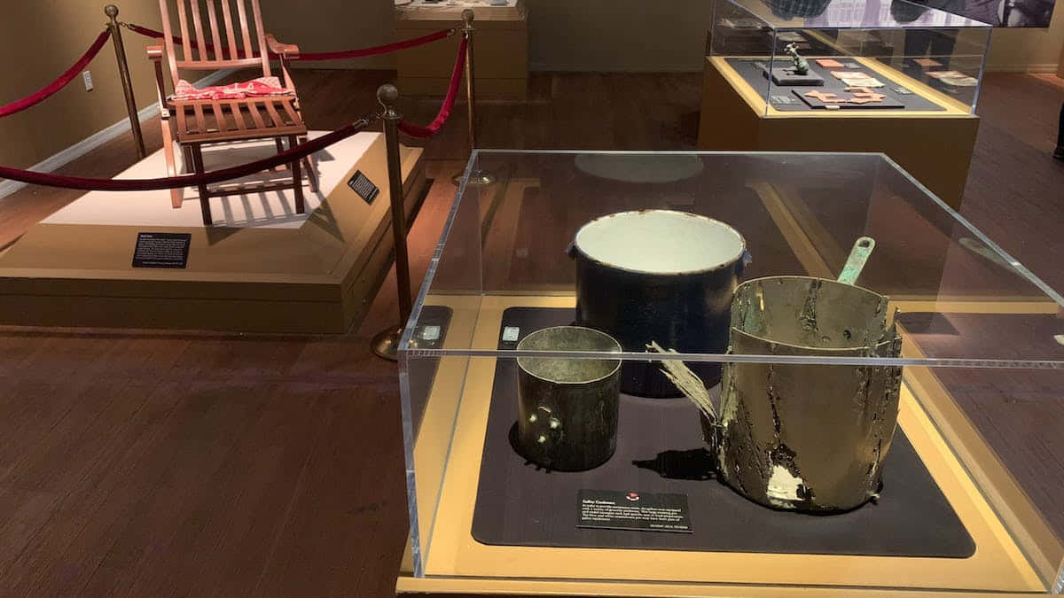 RMS Titanic Museum, metal cooking pots, wooden chair, SD Desktop Wallpaper
