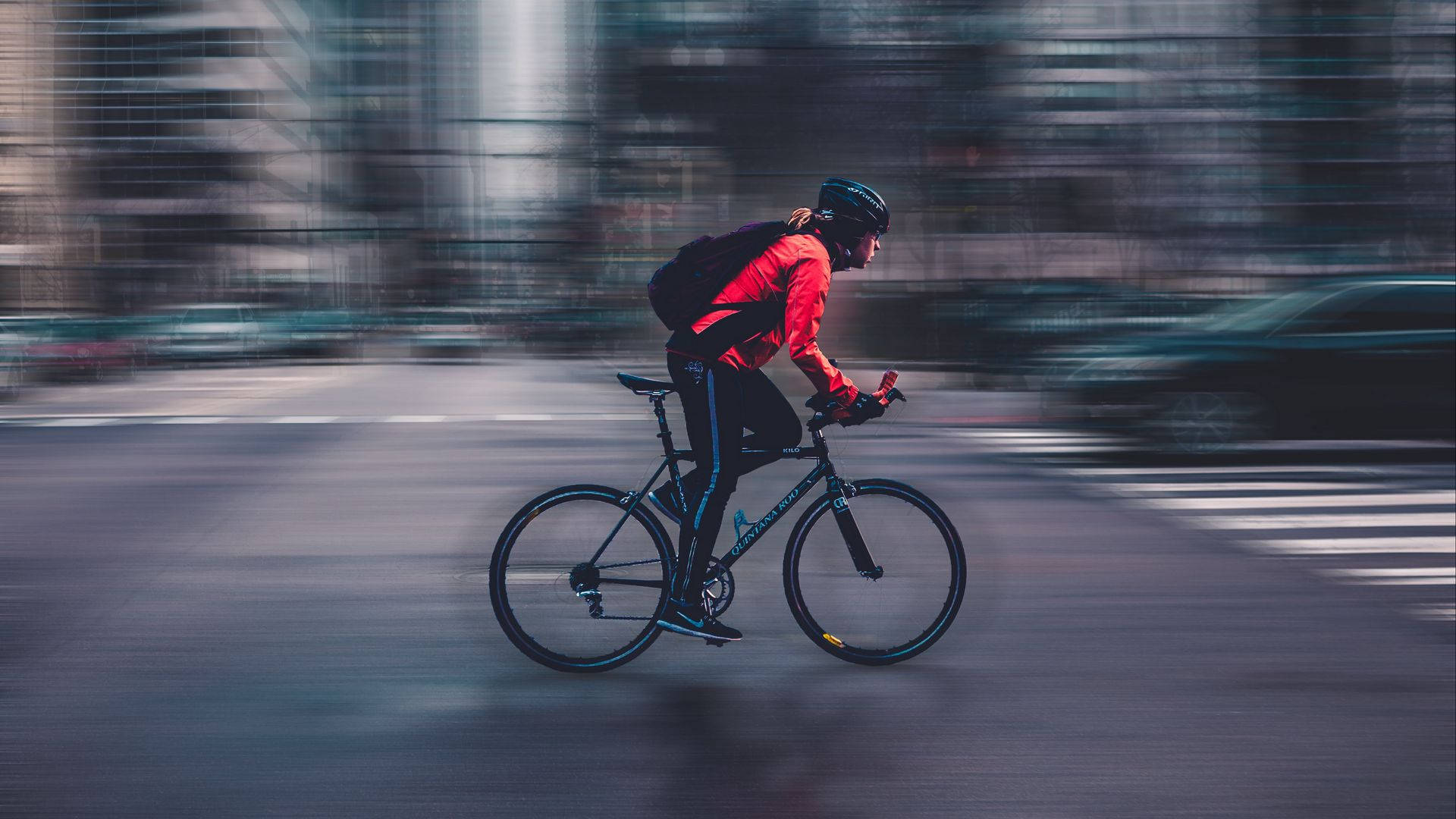 high speed road bike, red jacket, blurred urban street, Full HD Desktop Wallpaper