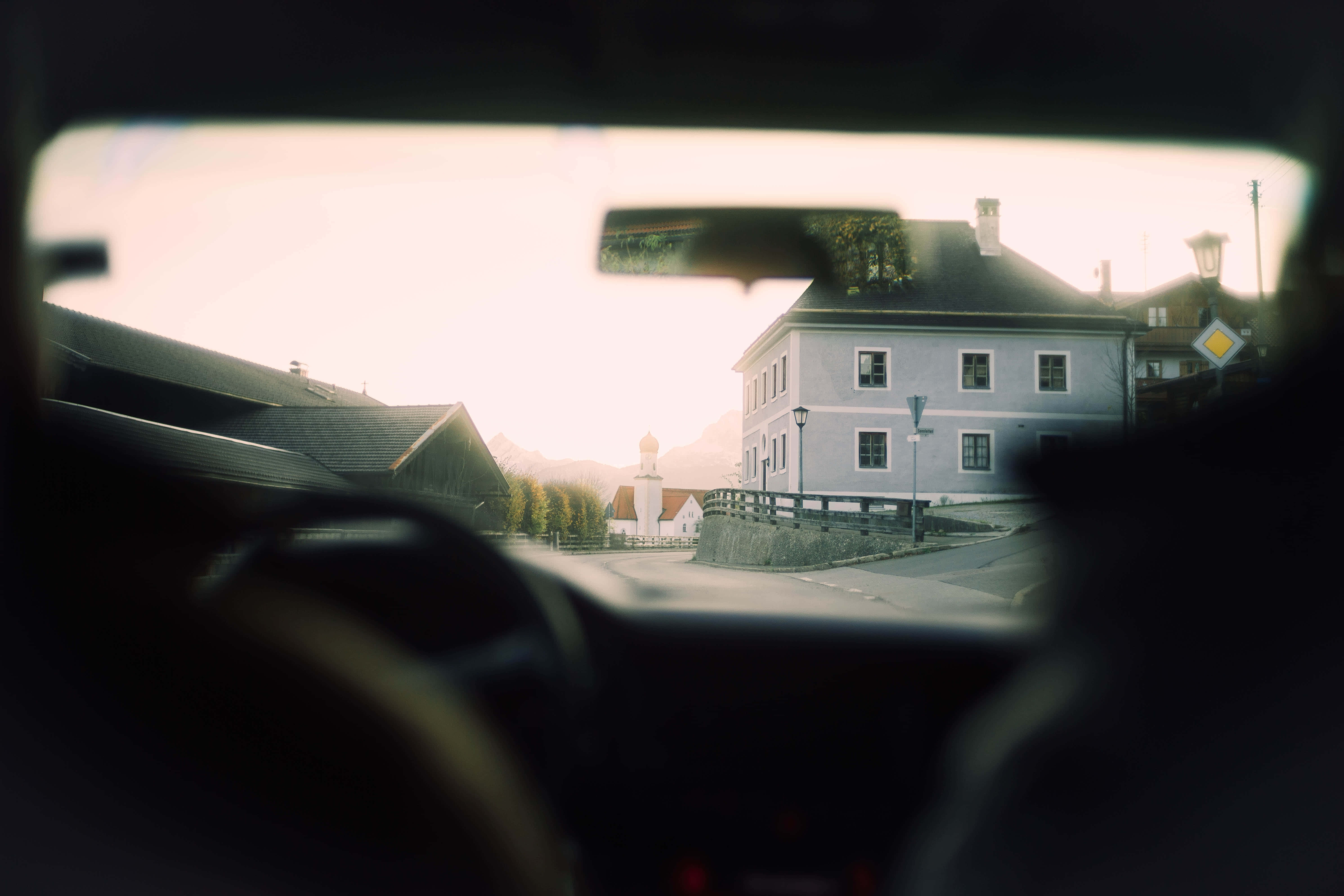 Road Trip, pastel buildings, distant mountains, 5K Desktop Wallpaper